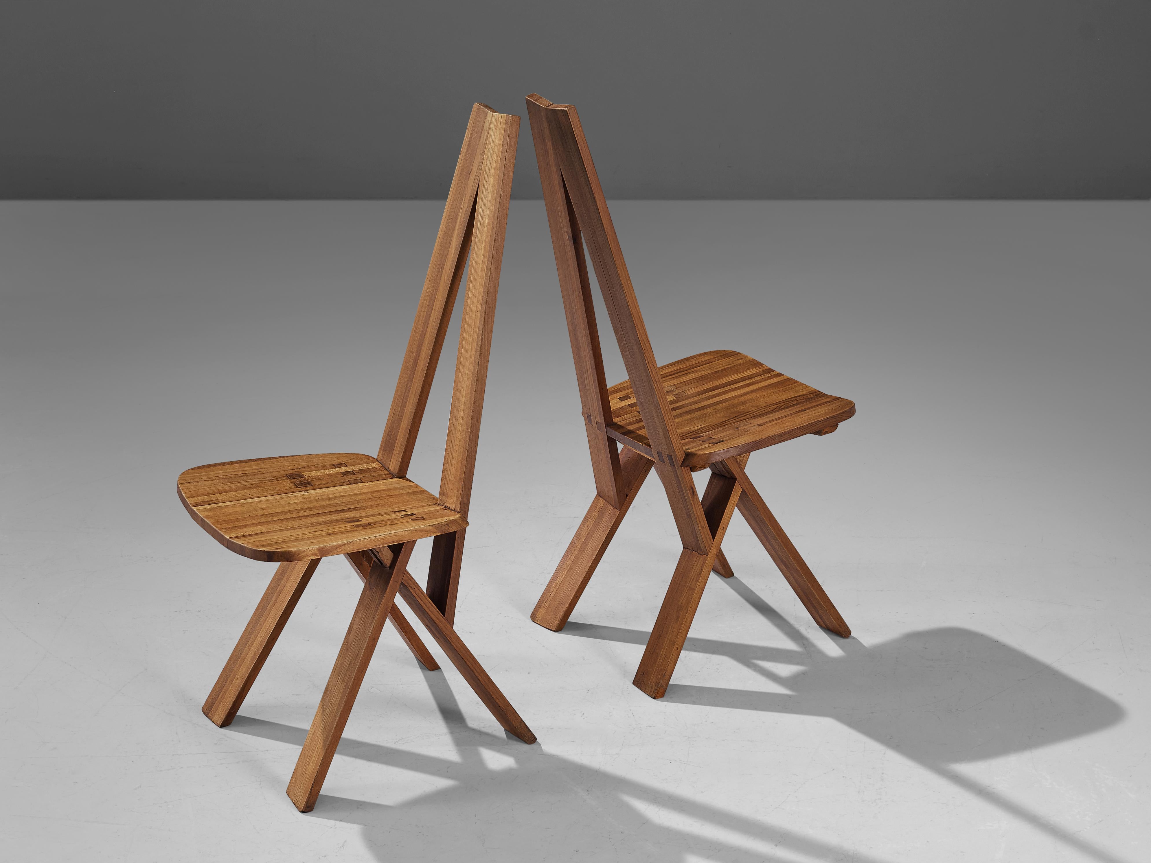Pierre Chapo, pair of 'Chlacc' chairs S45, elm, France, circa 1979

These 'Chlacc' dining chairs, model 'S45', is executed in solid elmwood, designed by Pierre Chapo. The extraordinary chairs are in excellent condition, showing an admirable patina.