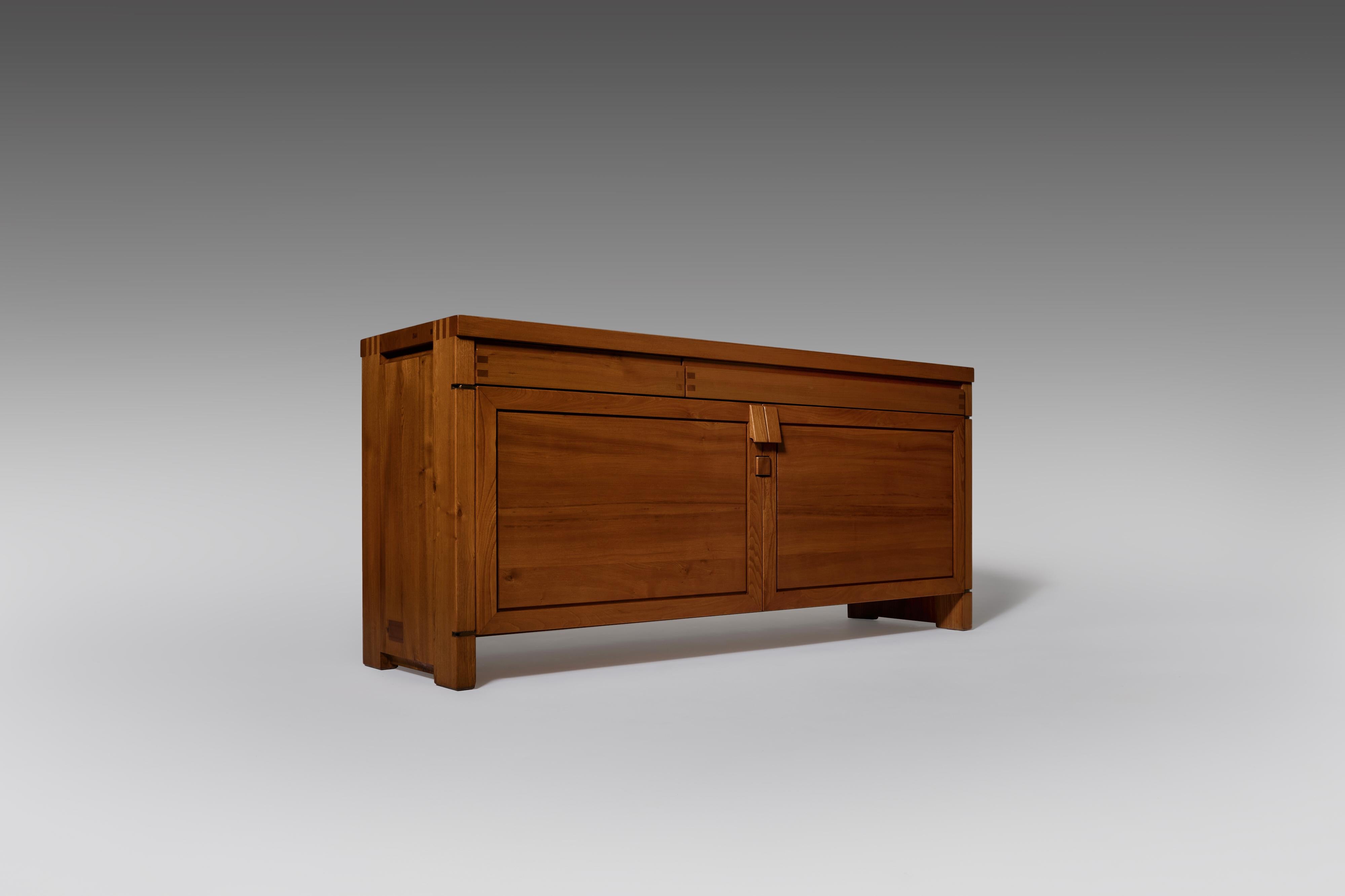 Impressive sideboard mod. 'R08' by Pierre Chapo, France, 1970. Remarkable design crafted out of solid French Elm. Sturdy yet refined design with many beautiful complex artisan details such as the wood-joint connections and special cut outs,