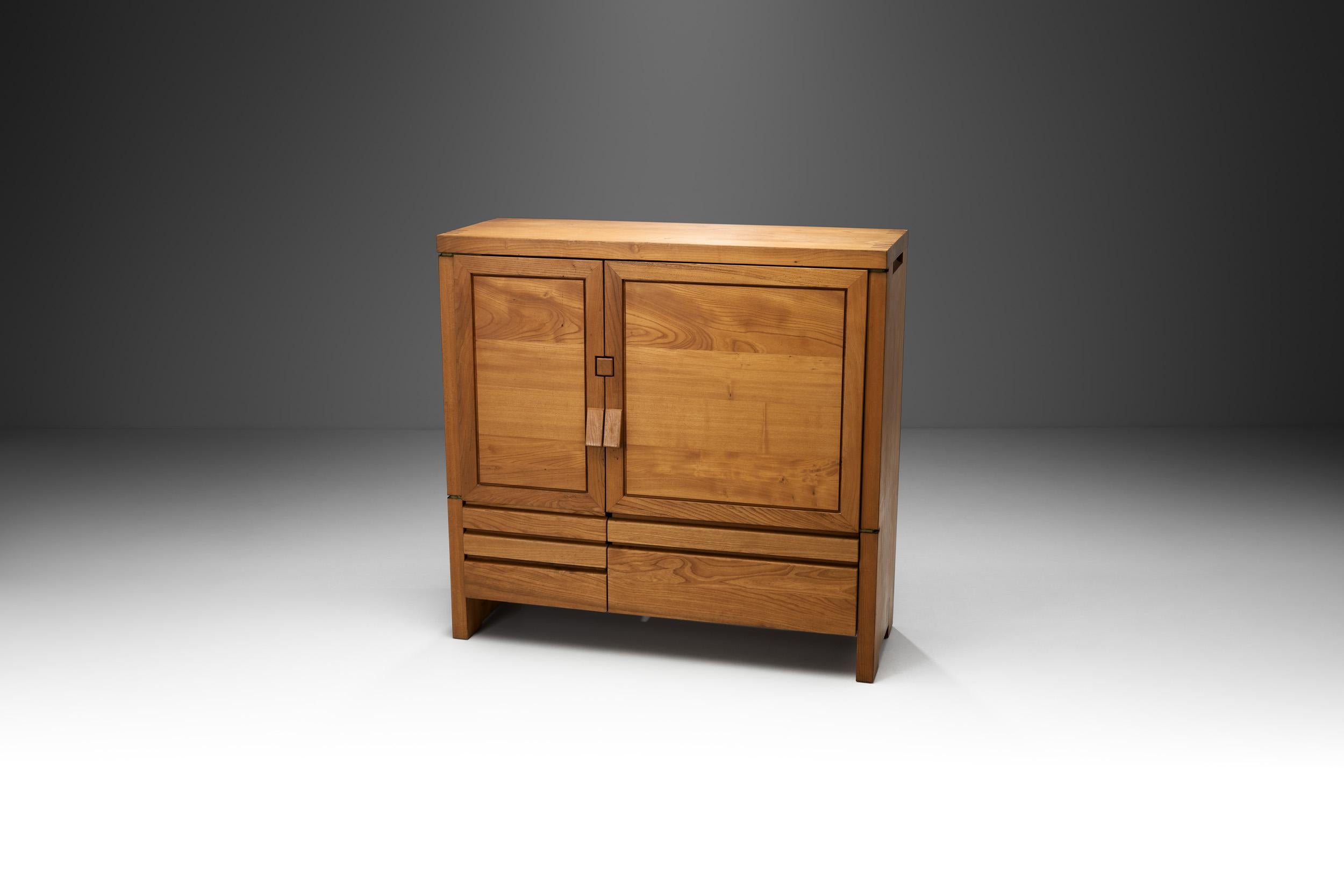 Pierre Chapo designed his famed “R18” storage cabinet around 1972. The design was constructed of French Elm, and it is a classic in all possible ways.

This cabinet is a combination of Chapo’s two other models; respectively the “R08” & the “R14”.