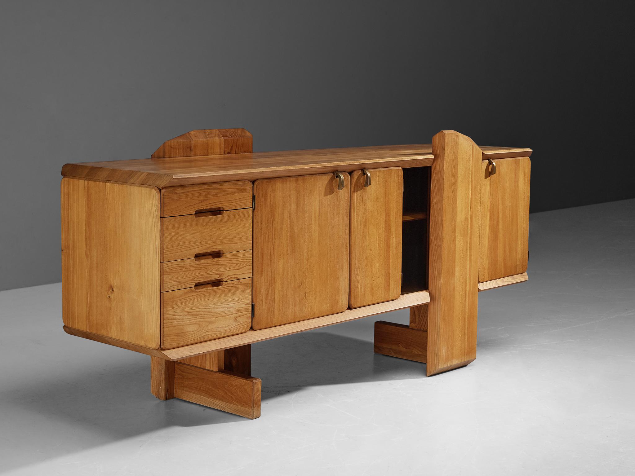 Pierre Chapo, sideboard, model 'R28', elm, France, 1985.

This design is an early edition, created according to the original craft methodology of Pierre Chapo. The R28 sideboard was a break from other pieces designed by Pierre Chapo. From 1981