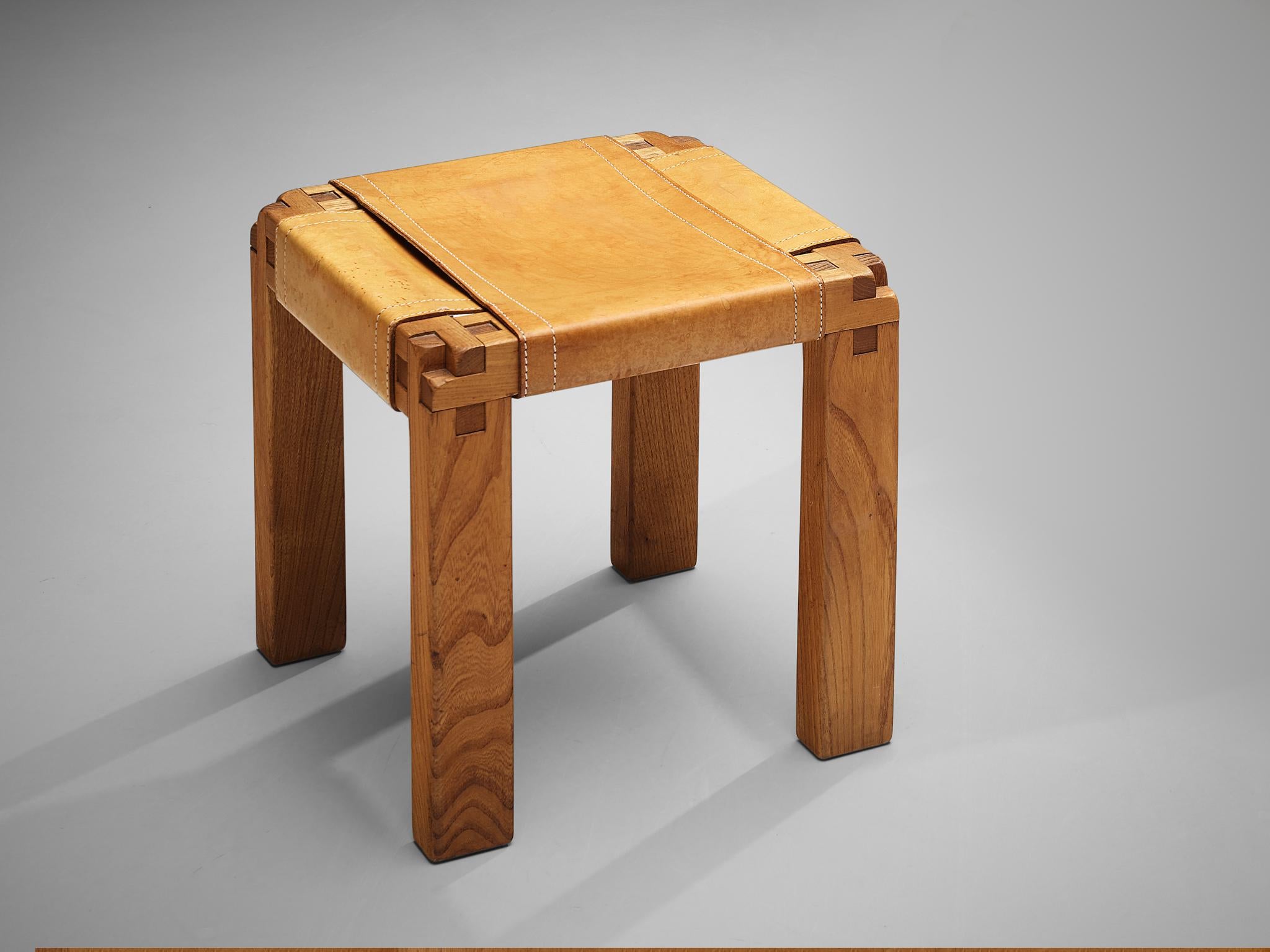 Pierre Chapo, stool S11X, elm, cognac leather, France, circa 1966

The S11X stool by Pierre Chapo shows great craftsmanship. The two leather sheets are wrapped around the elm wood frame. Chapo designed the S11 chairs and the stools with a particular