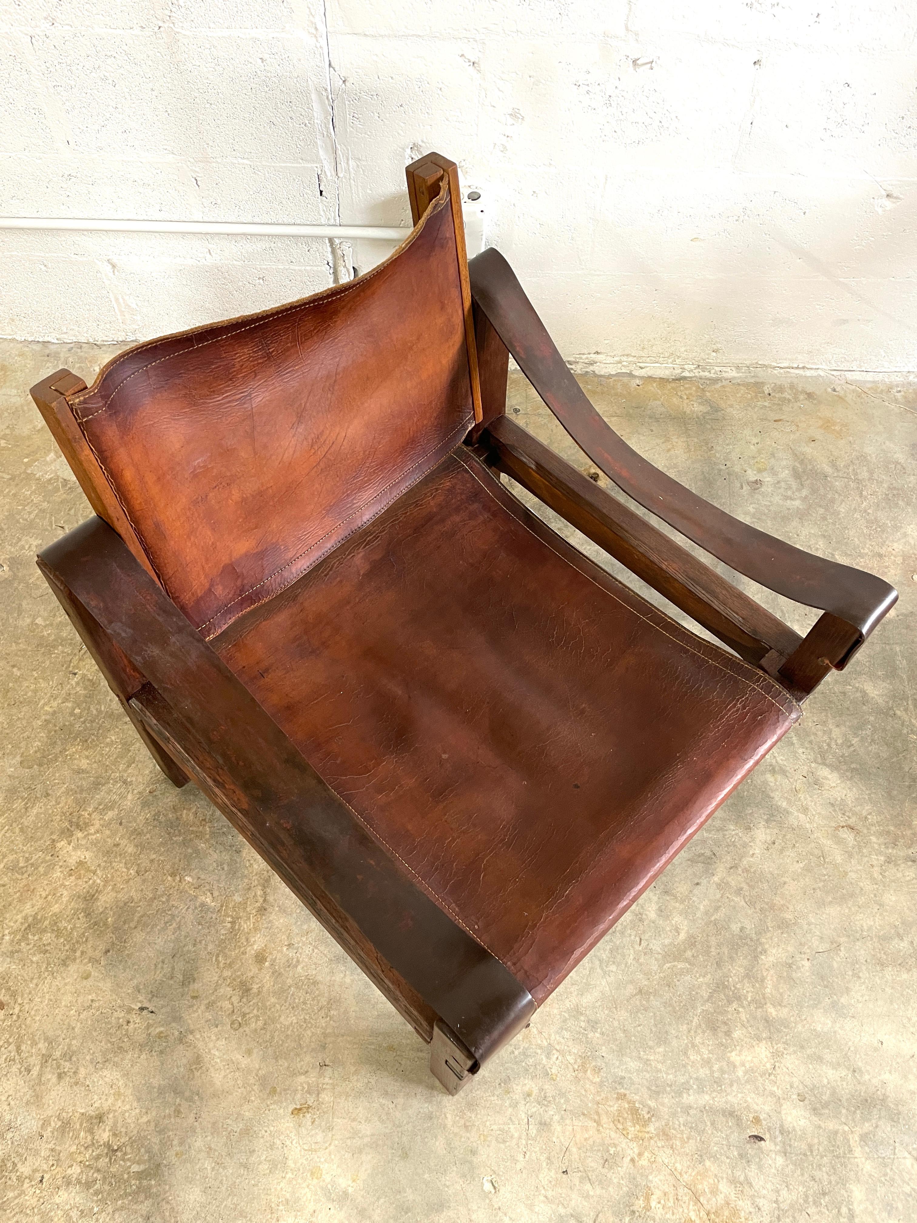 Iconic Pierre Chapo S10 Chair. France 1960s. Original saddle leather and sold elm wood. This model became one of the leading designs at his gallery.