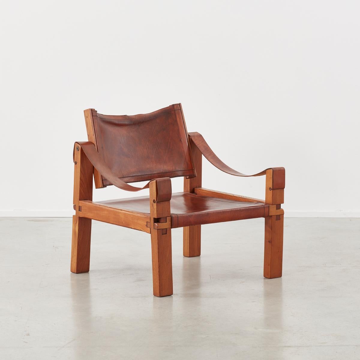 Pierre Chapo (1927-1987) was a French craftsman who specialised in handmade wooden furniture using traditional craftsmanship. The S10 chair is crafted from solid elm and cognac leather with a pleasing aged patina.

The chair’s detailing at first