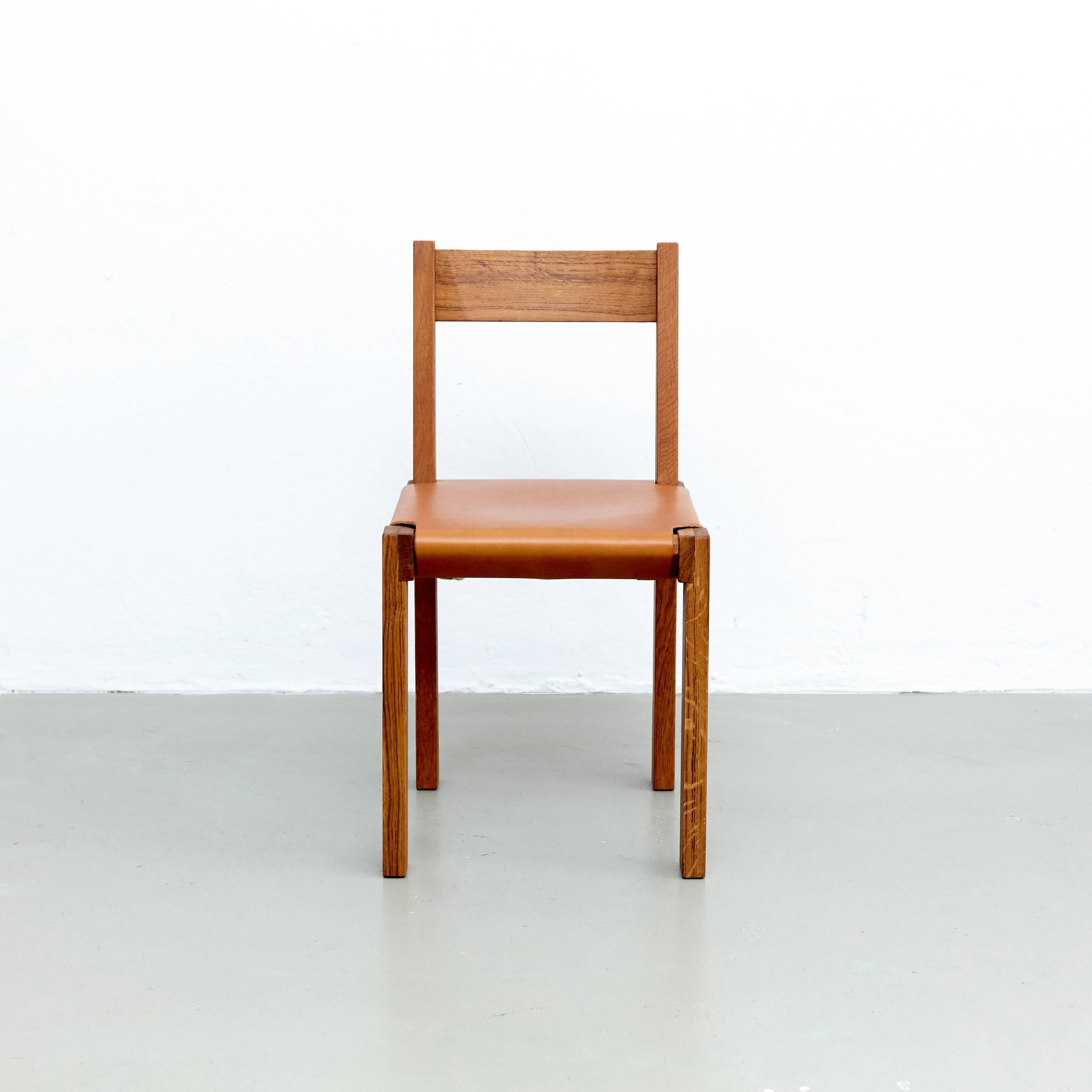 S 24 chair designed by Pierre Chapo, circa 1960.
Manufactured by Chapo Creation in France, 2017.
Solid oakwood, Seat stretched in thick leather.

In good original condition, with minor wear consistent with age and use, preserving a beautiful