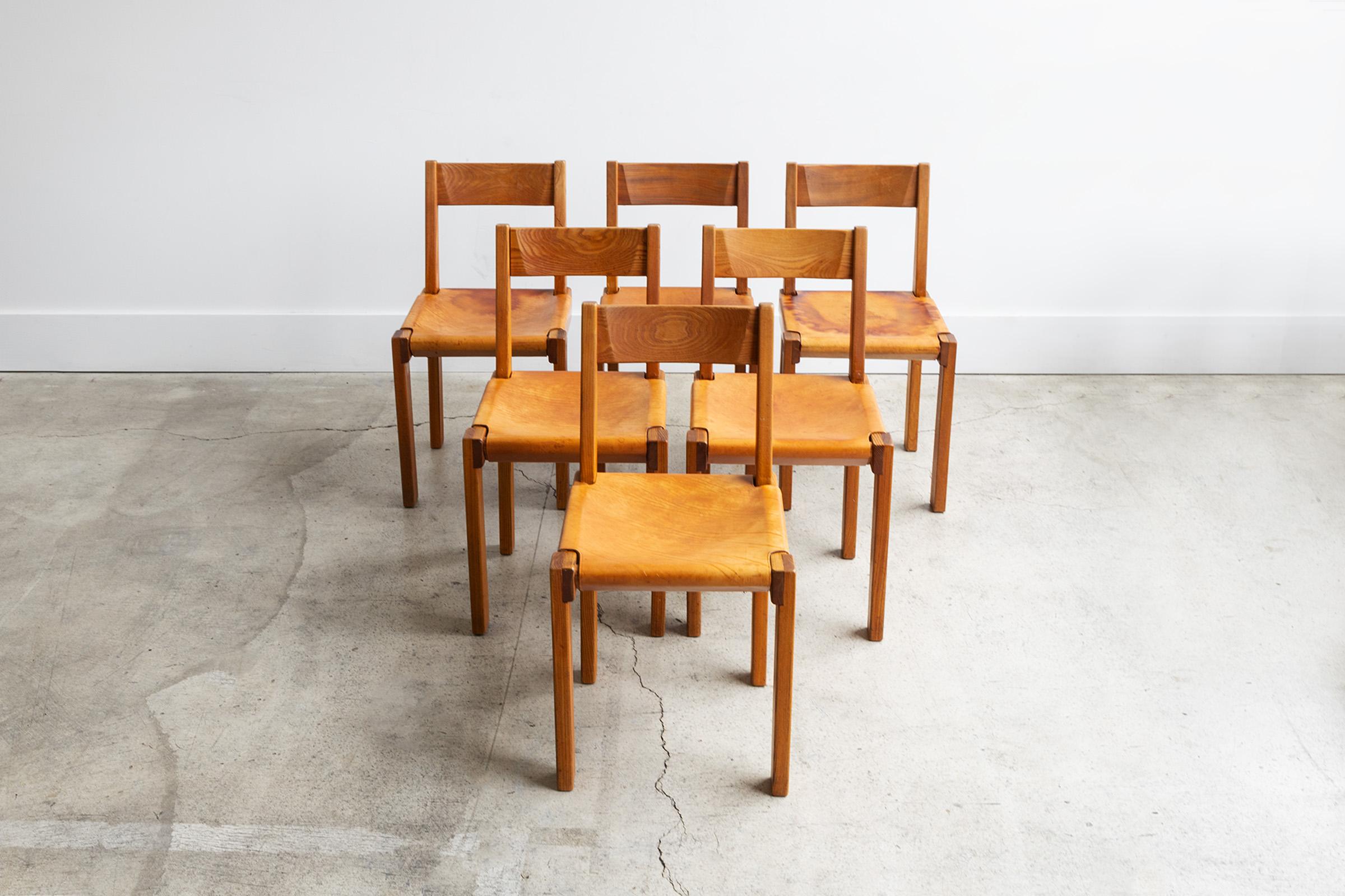Ultra-rare set of six original S24 dinning chairs designed by Pierre Chapo. These examples were imported from France in the 1960s. They feature original leather seats and gorgeous elmwood frames. We've sourced plenty of dinning chairs over the