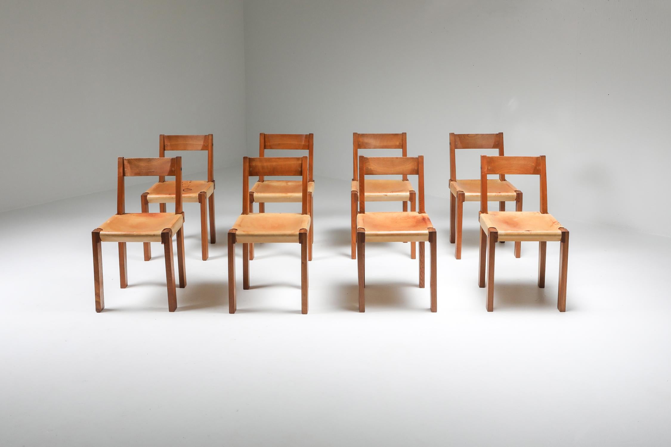 Pierre Chapo, 7 available dining chairs, model S24, elm and natural leather, France, circa 1966

Dining chairs in solid elmwood with saddle leather seating and back. Designed by French designer Pierre Chapo in Paris. These chairs have a cubic design