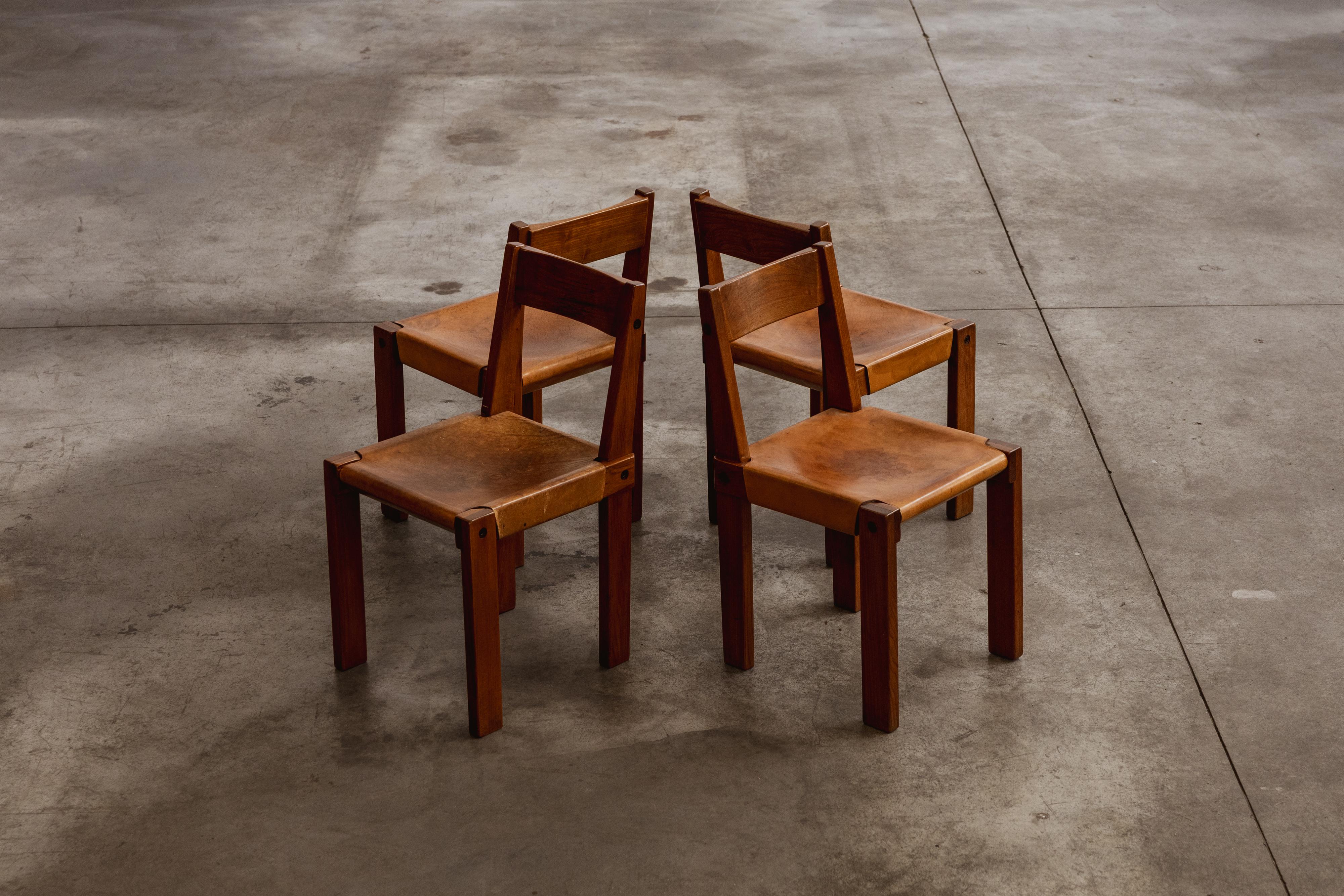 Pierre Chapo “S24” dining chairs for Atelier Pierre Chapo, elm and leather, France, 1966, set of four.

Pierre Chapo designed the “S24” dining chairs for his friend, Dr. Hiroshi Nakajima. These chairs reflect Chapo's inspiration from Frank Lloyd