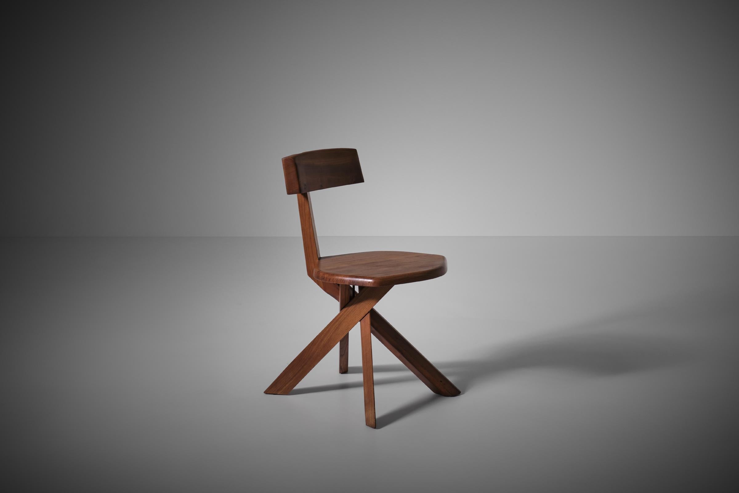 Sculptural chair model ‘S34’ by Pierre Chapo, France 1960s. Remarkable design with the turned asymmetrical base, which is also used for table series - one of the best pieces by Chapo. The chair is made in solid Elm with a beautiful exposed grain and