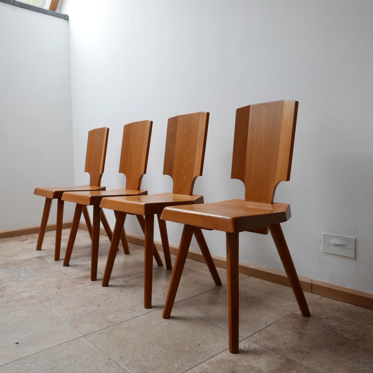 Pierre Chapo dining chairs.

French Elm.

S28 Model.

France, circa 1970s.

Another pair is due in from France so a set of six can be made.

Price is for the set of 4.

Vintage condition, some scuffs and marks commensurate with