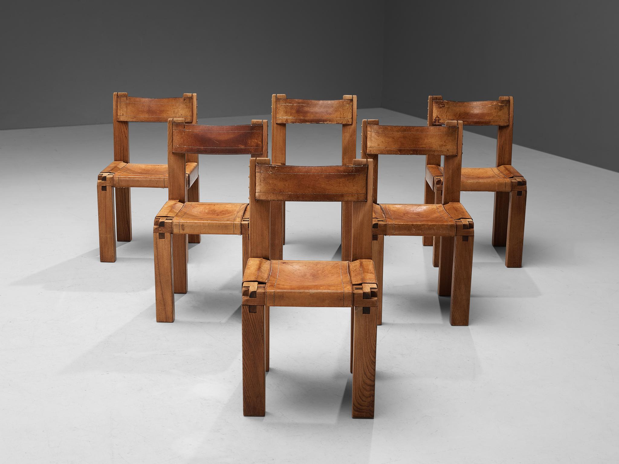 Pierre Chapo, dining chairs model 'S11', elm, leather, France, circa 1966.

A set of six chairs in solid elmwood with cognac leather seating and back, designed by French designer Pierre Chapo. These chairs have a cubic design of solid elmwood with