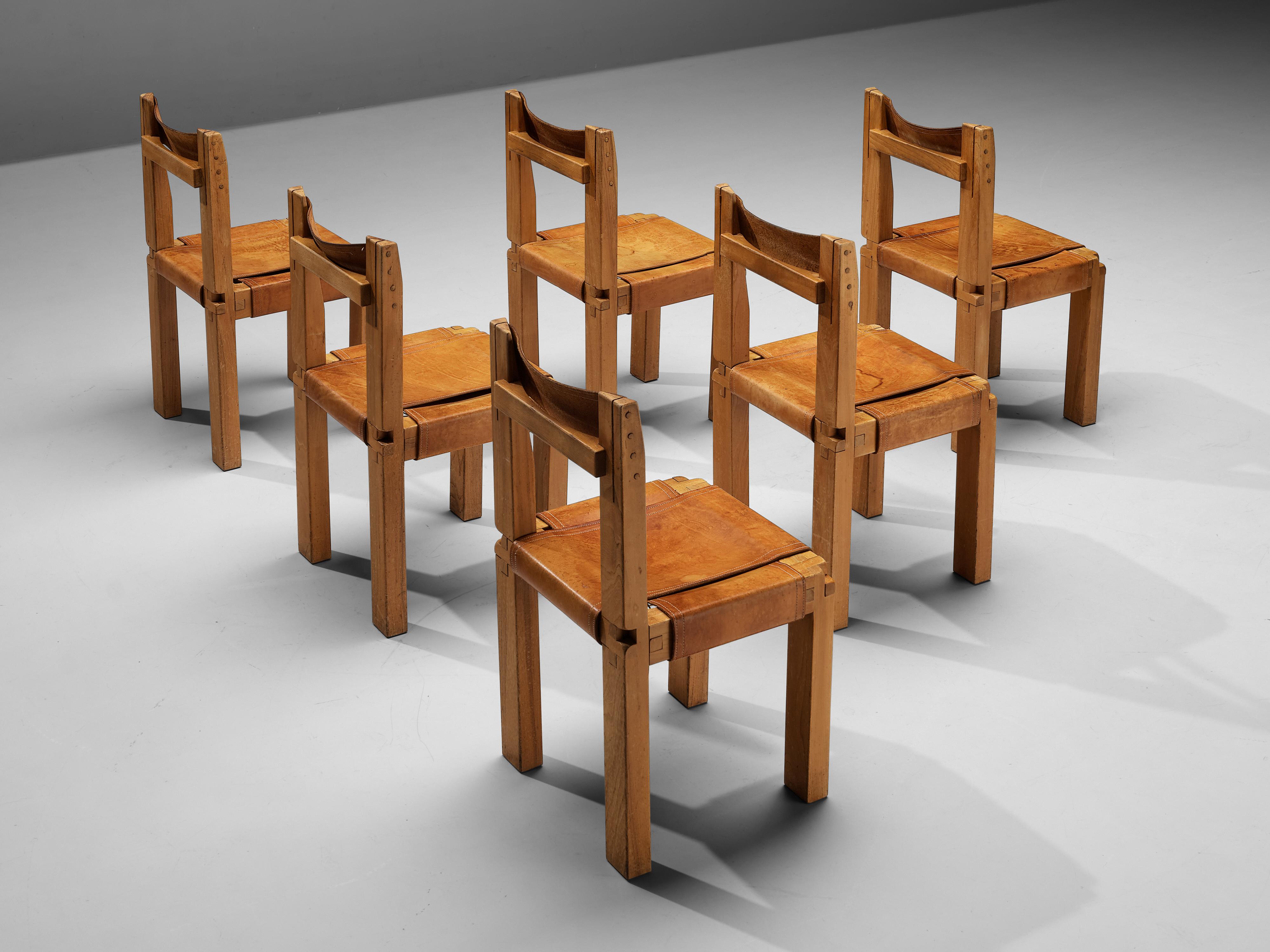 Pierre Chapo, set of six dining chairs, model 'S11', elm, leather, France, 1960s 

A set of six chairs in solid elmwood with cognac leather seating and back, designed by French designer Pierre Chapo. These chairs have a cubic design of solid elmwood