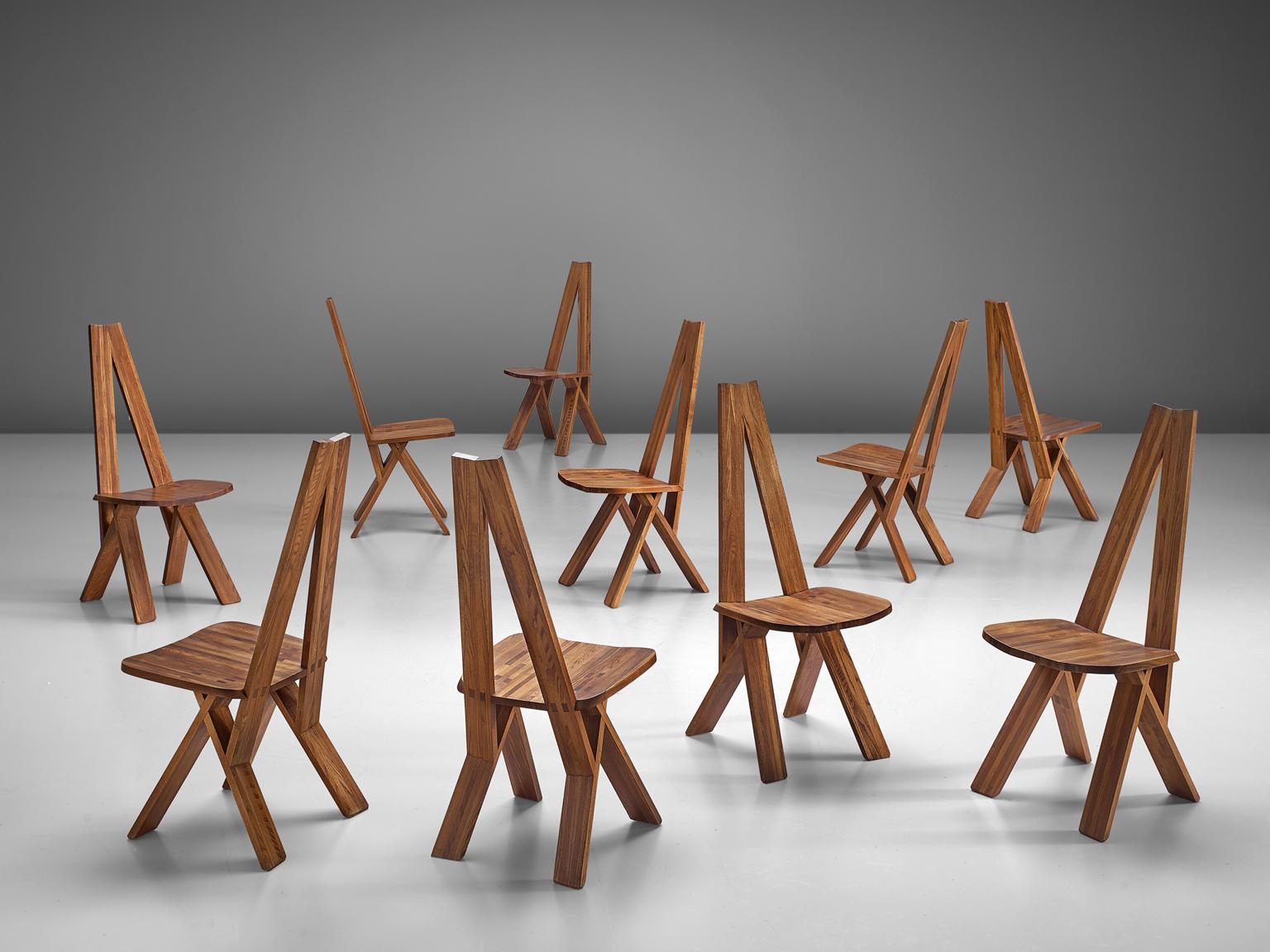 Set of ten 'Chlacc' chairs, in elm, by Pierre Chapo, France, circa 1979.

This set of ten 'Chlacc' dining chairs, model S45, are executed in solid elmwood. Designed by Pierre Chapo. These extraordinary chairs are in excellent condition, showing an