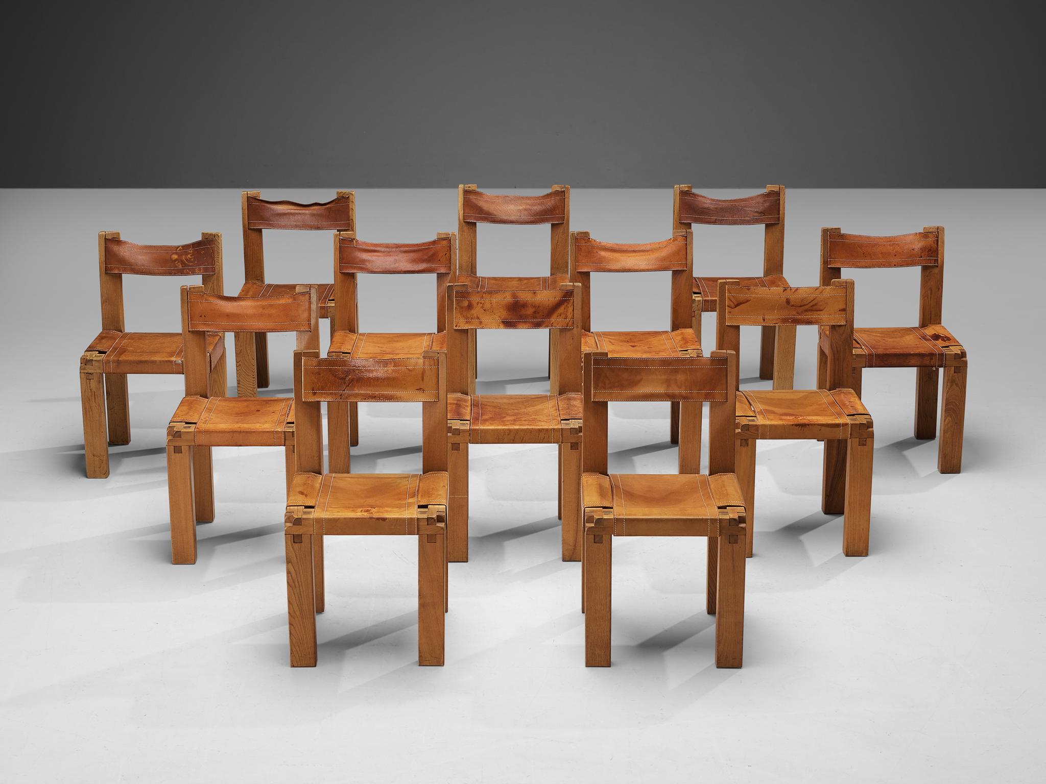 Pierre Chapo, dining chairs model 'S11', elm, leather, France, circa 1966.

A set of twelve chairs in solid elmwood with cognac leather seating and back, designed by French designer Pierre Chapo. These chairs have a cubic design of solid elmwood