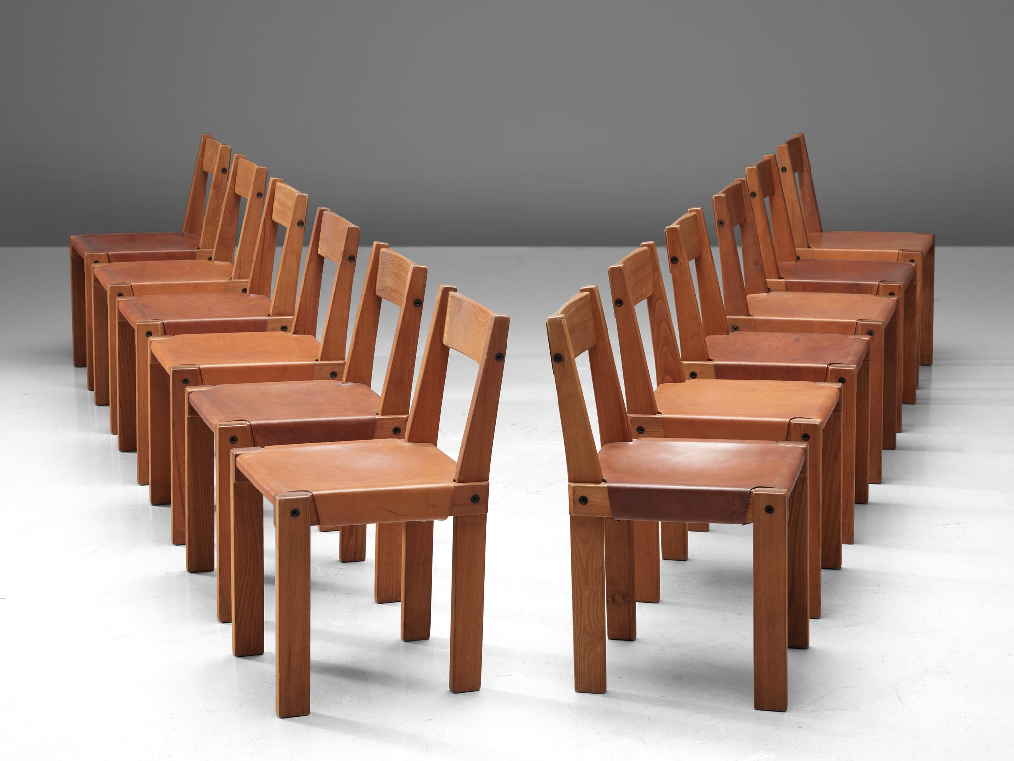 Pierre Chapo, set of 12 dining chairs, model S24, elm and leather, France, circa 1966.

A set of 12 chairs in solid elmwood with saddle leather seating and back. Designed by French designer Pierre Chapo in Paris. These chairs have a cubic design