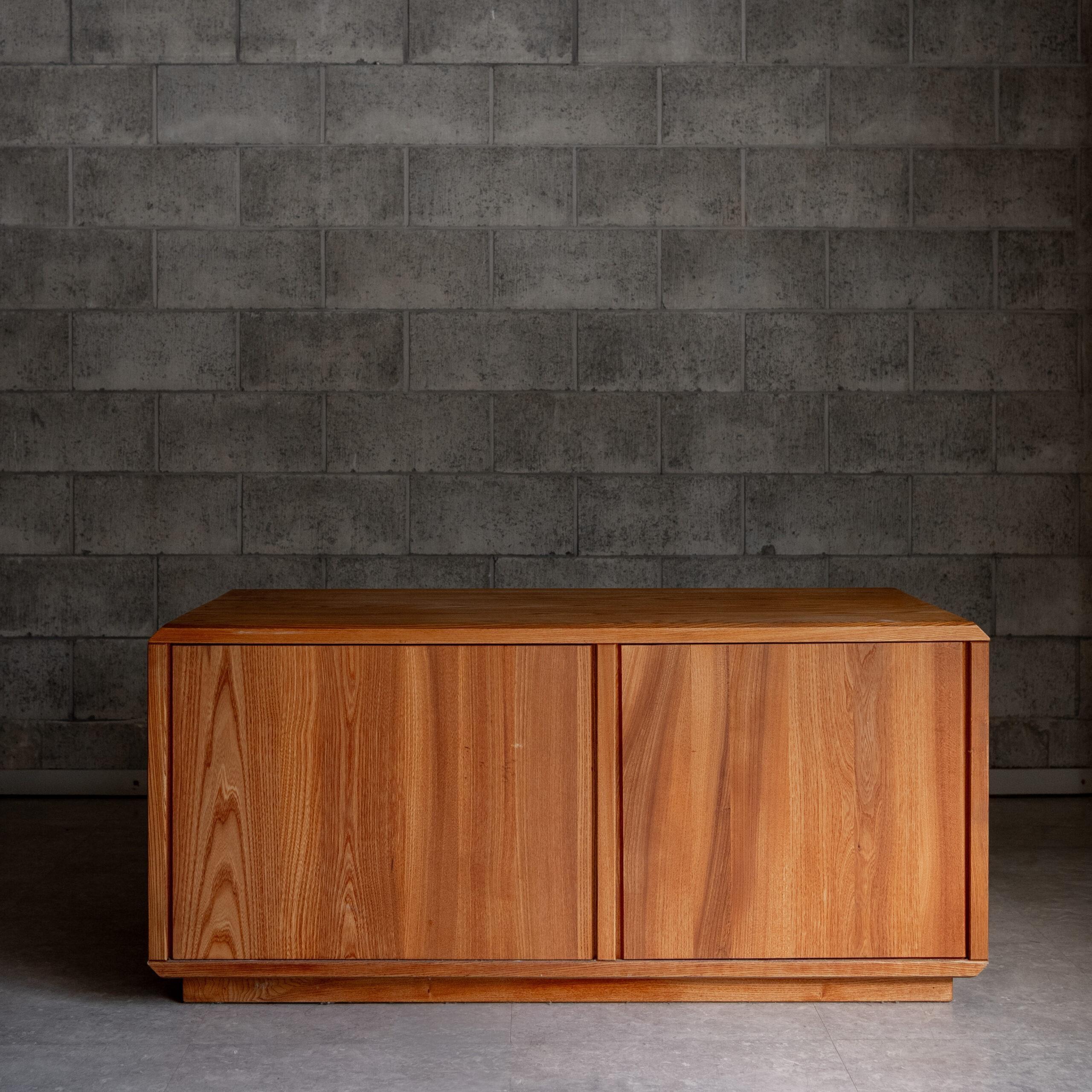 A solid elm modular sideboard by Pierre Chapo, model B40.
Part of the B10 system, it embodies Chapo’s vision of adaptable living through honest structure and proportion.
Functional clarity rendered in warm, enduring wood.
