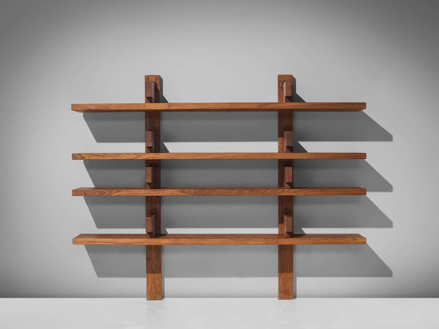 Pierre Chapo, bibliothèque, model no. B17B, elm, France, 1960s.

Model 'B17' - shelves designed by Pierre Chapo. The shelving system was created in 1967 were is was presented at the Salon des Arts Ménagers. This robust and solid bookcase consist