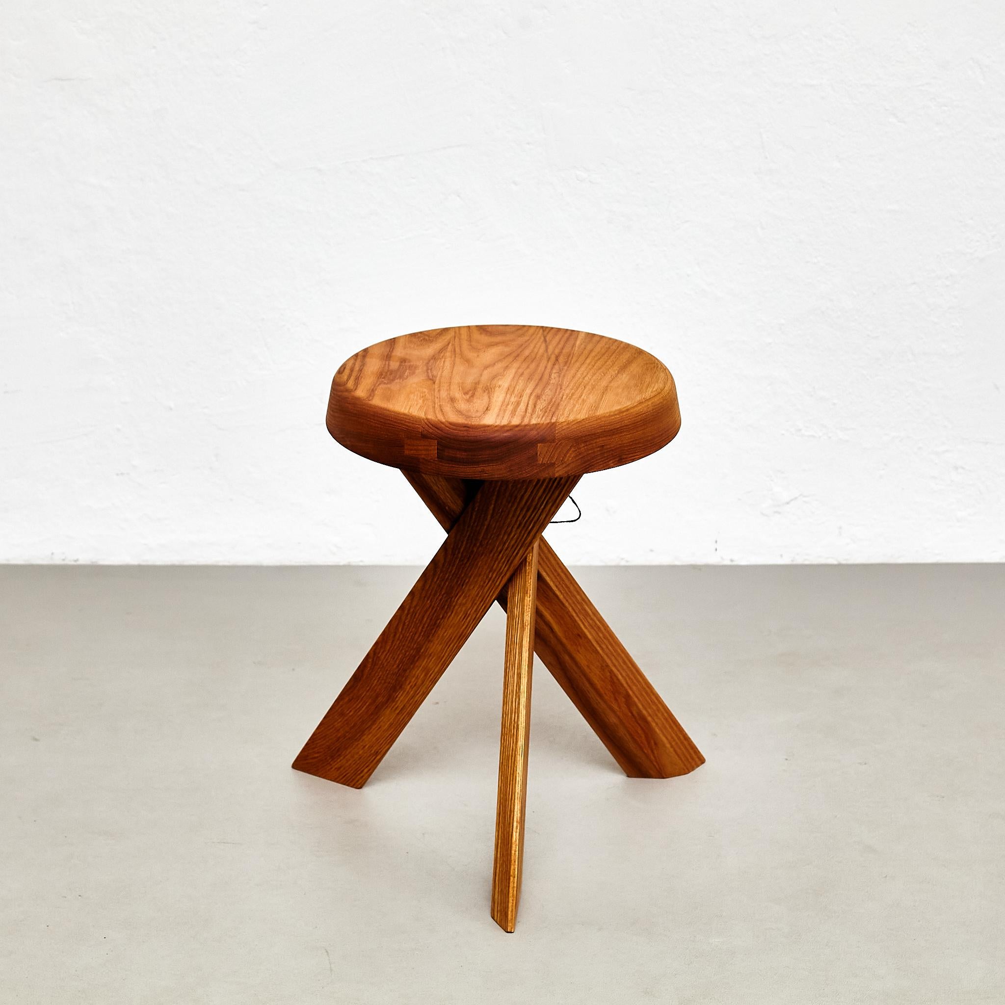 S 31 B stool designed by Pierre Chapo, circa 1960.
Manufactured by Chapo Creation in France, 2021.
Stamped solid elmwood.

In good original condition, with minor wear consistent with age and use, preserving a beautiful patina.

Pierre Chapo is born