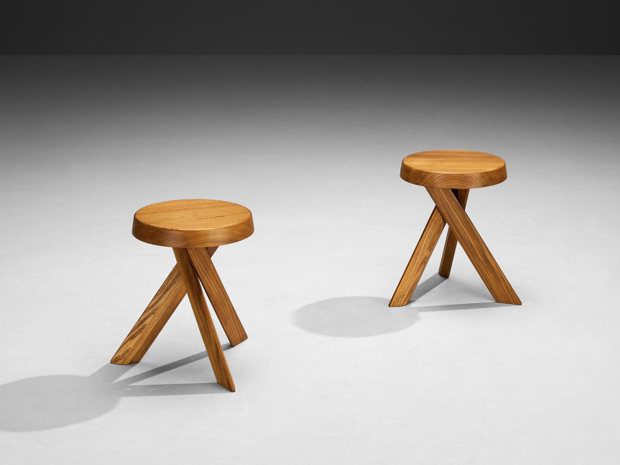 Pierre Chapo, stools, model 'S31A', solid elm, France, circa 1974

This S31A stool is one of the early editions designed by Pierre Chapo, known for his hallmark use of solid elmwood and a commitment to pure and clean design and construction