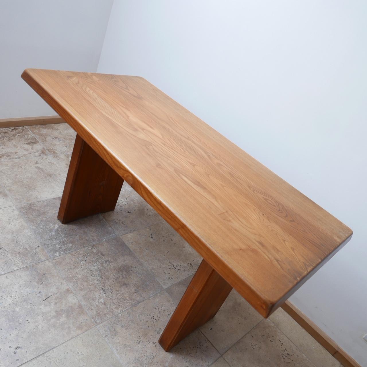 A dining table by design legend Pierre Chapo. 

France, c1970s. 

French elm. 

T14 Model. 

Typical of Chapo's quality of materials and construction. 

In good vintage condition. 

Dimensions: 72.5 H x 69 D x 138 W in cm. 

 