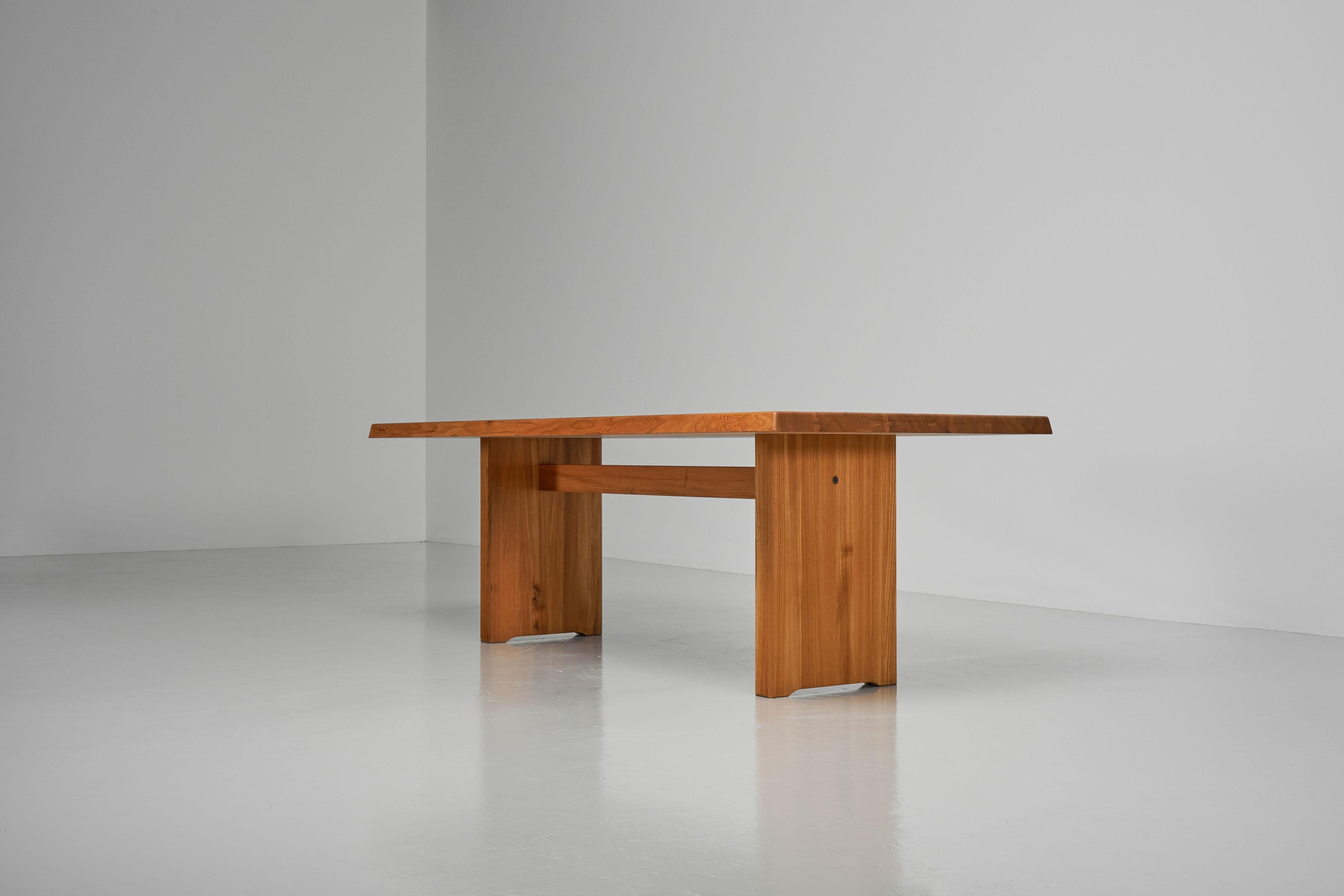 Beautiful early, super conditioned T14D dining table designed by Pierre Chapo and manufactured in his own workshop in Gordes, France 1963. This dining table is made of solid elmwood has very nicely constructed tabletop. The wood-joint connections on