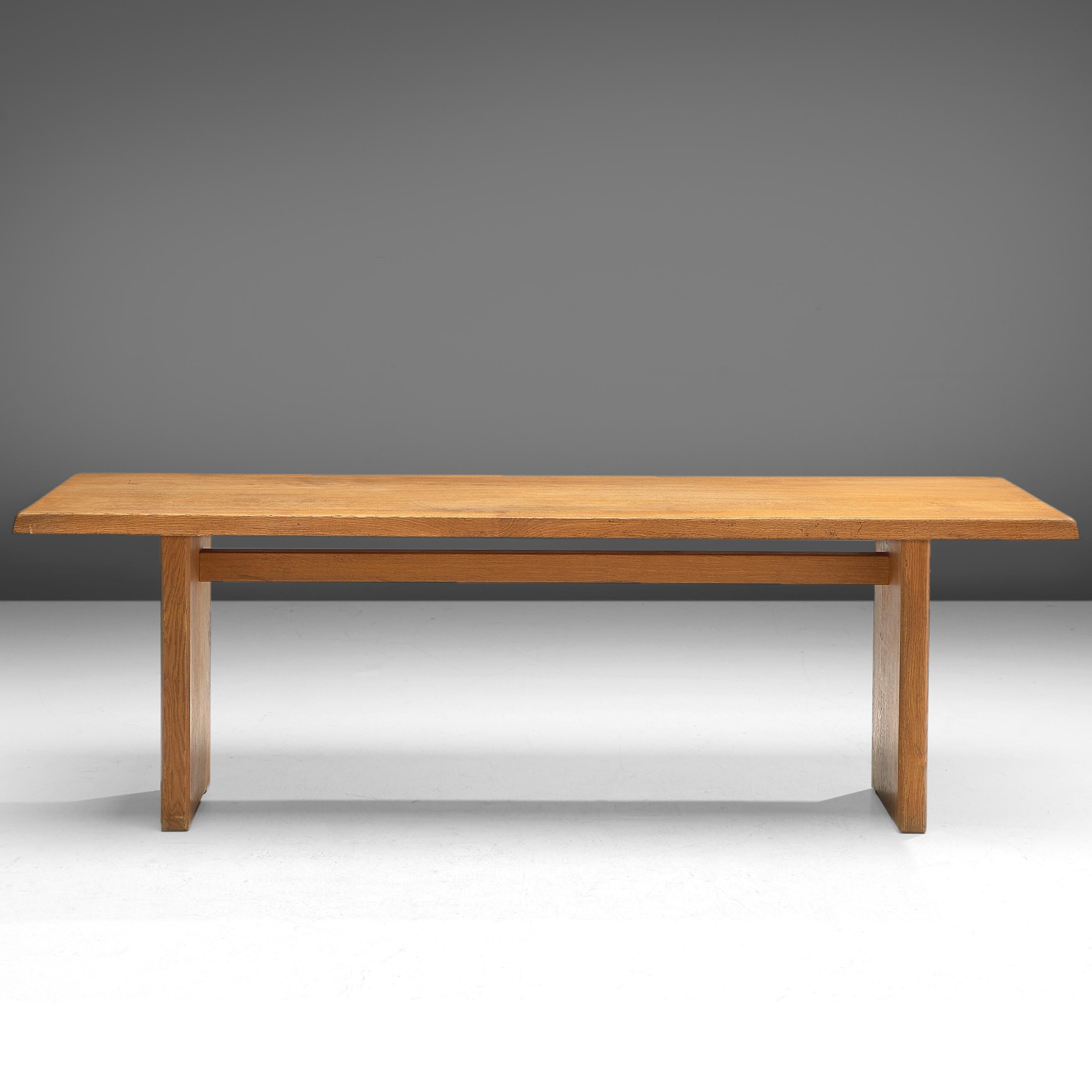 Pierre Chapo, dining table model T14D, oak, France, design 1960s, later production.

This dining table is designed by the French designer Pierre Chapo. The rectangular tabletop with sloping edges, rests on a two-legged base. Strong and simplified