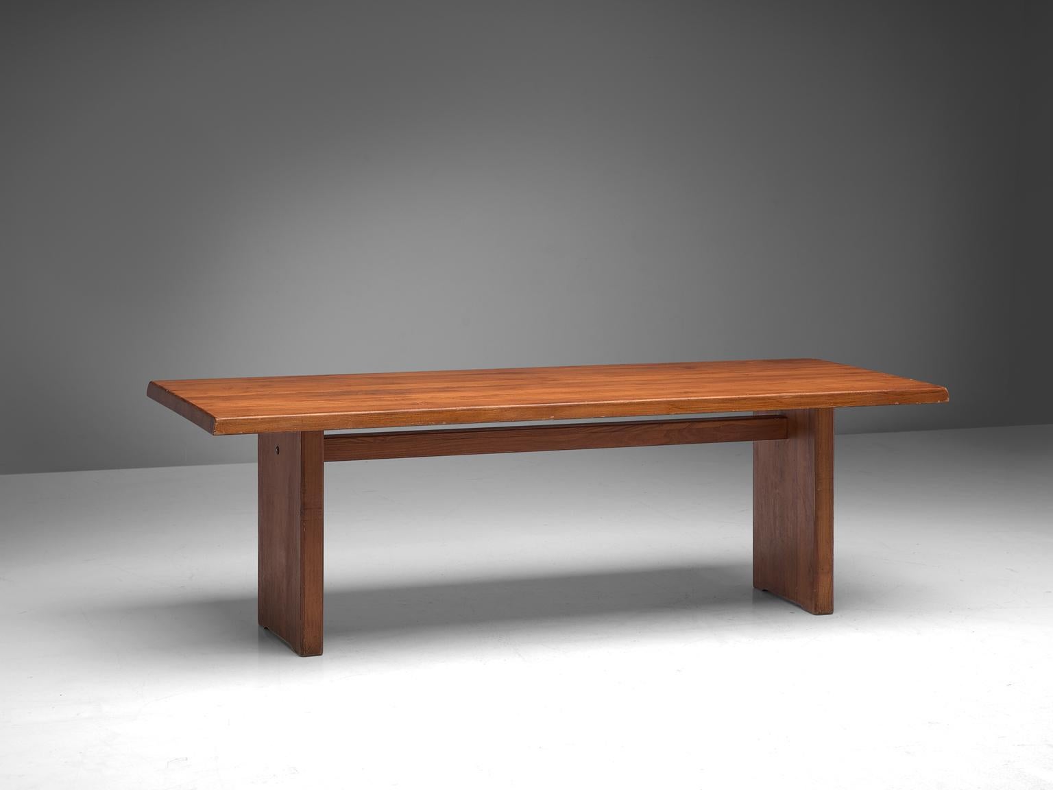 Pierre Chapo, dining table model T14D, elmwood, France, 1960s. 

This dining table is designed by the French designer Pierre Chapo. The rectangular tabletop with sloping edges, rests on a two-legged base. Strong and simplified design which clearly