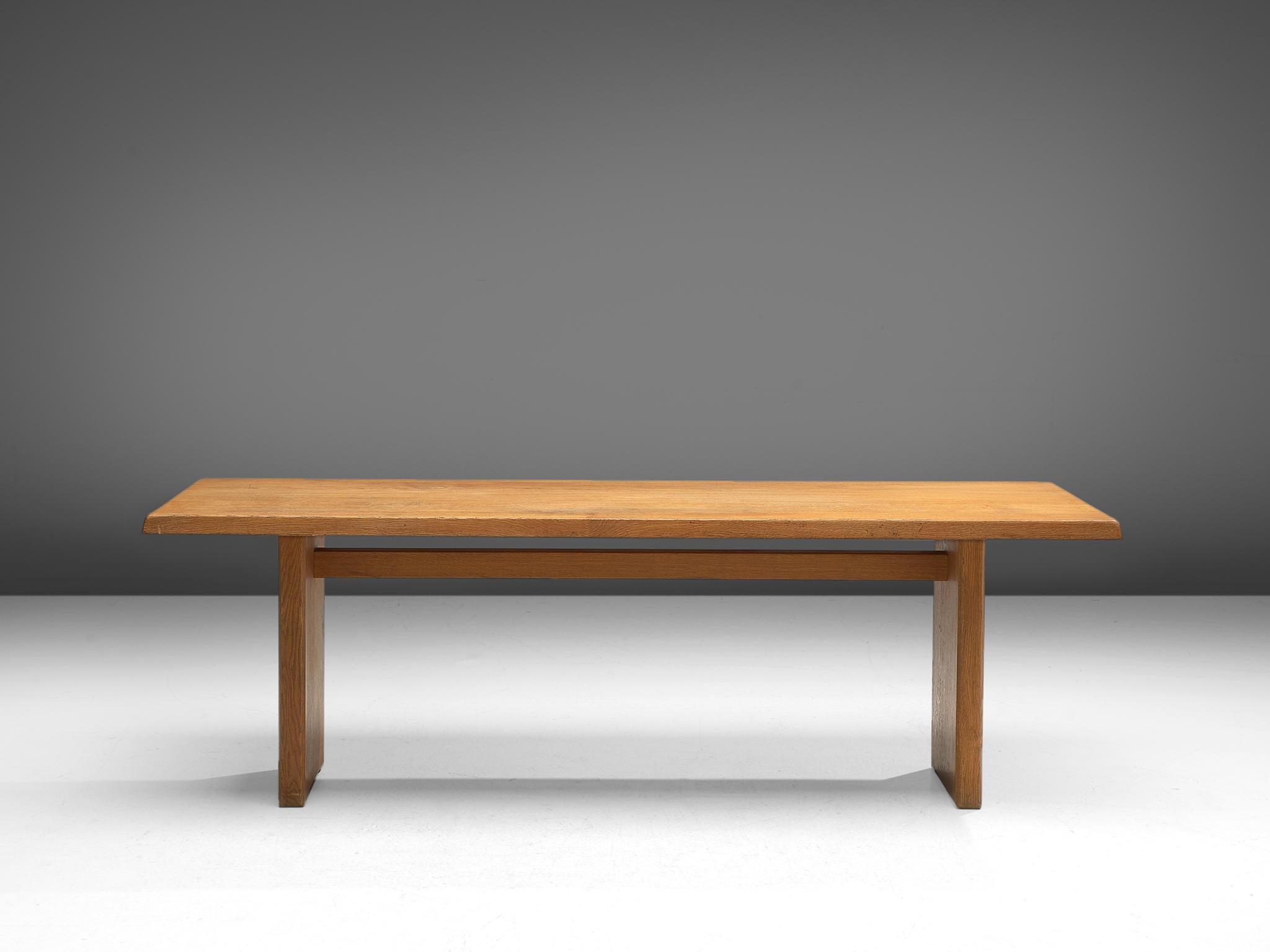 Pierre Chapo, dining table model T14D, oak, France, design 1960s, later production.

This dining table is designed by the French designer Pierre Chapo. The rectangular tabletop with sloping edges, rests on a two-legged base. Strong and simplified