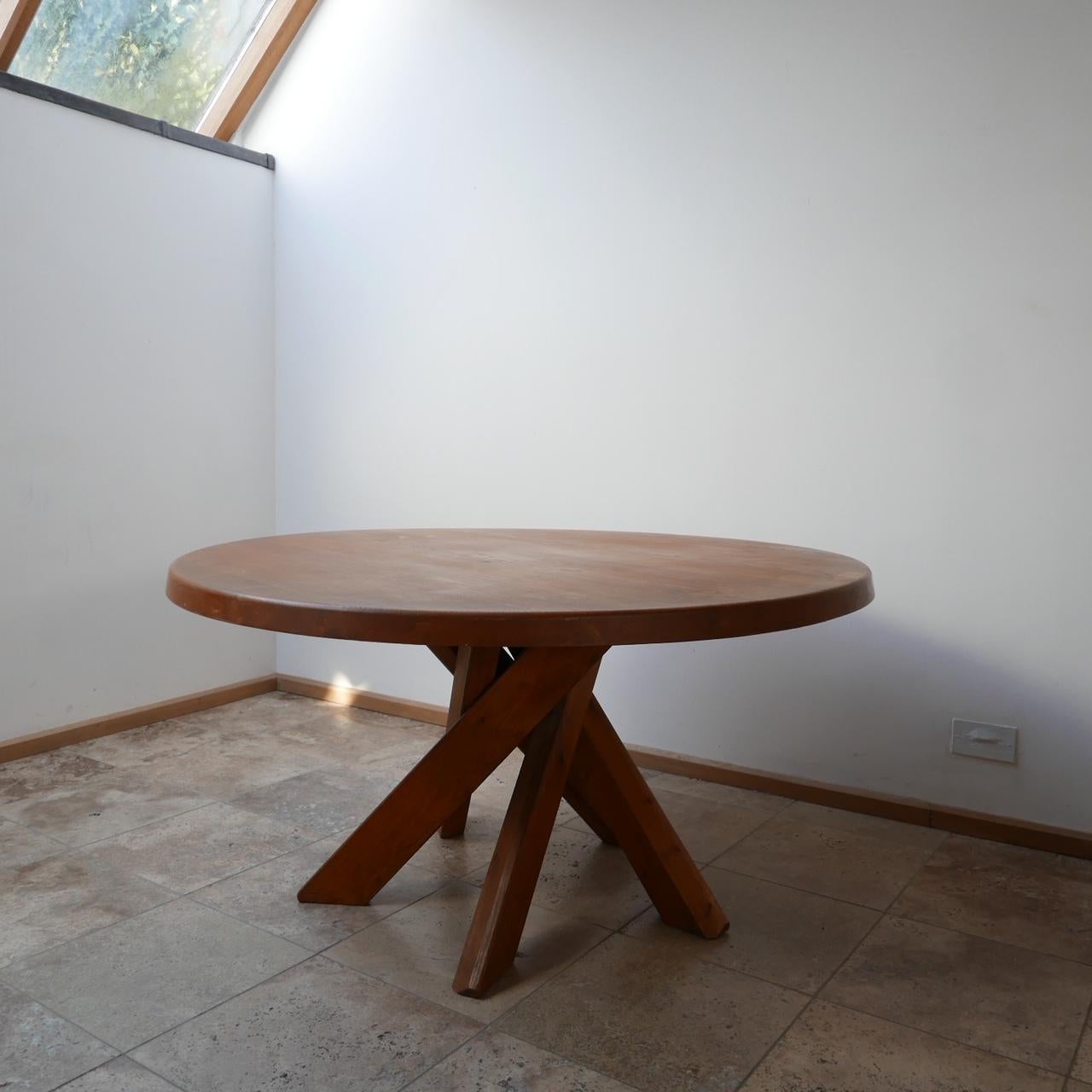 A scarce dining table by Pierre Chapo. 

T21 Model. 

Solid French elm 

France, c1970s. 

Five legs in an architectural manner with amazing formed design typical of Chapo's quality. 

Dimensions: 73 height x 138 diameter in cm.

    