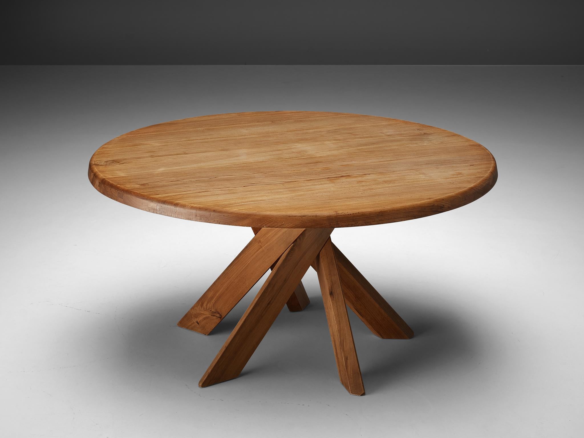 Pierre Chapo, dining table model T21, elm, France, 1960s

This round dining table is designed by Pierre Chapo. The shape of the base creates a very dynamic look. The perfectly made solid wood joints, also shown on the side of the top with double