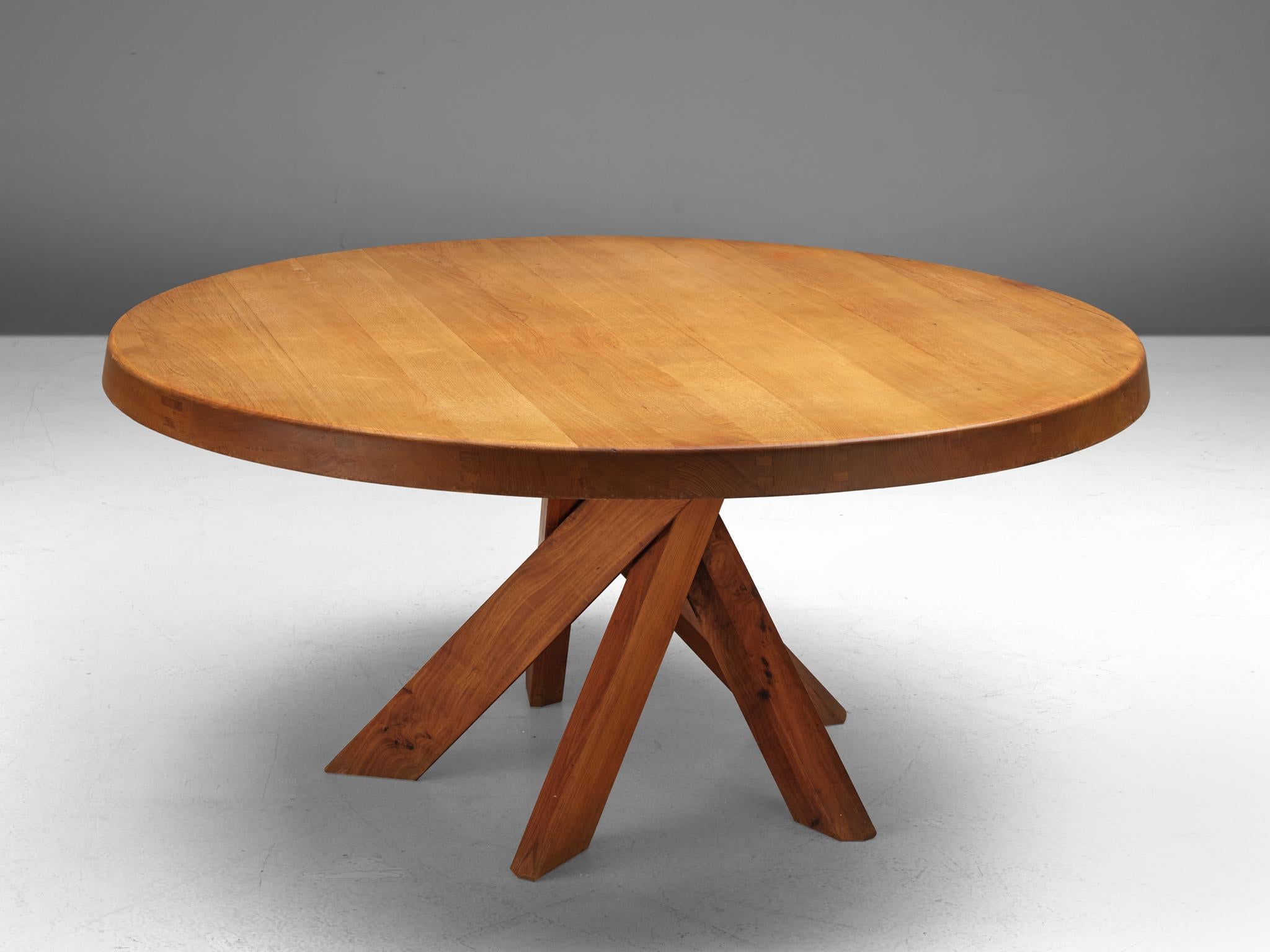 Pierre Chapo, T21E 'Sfax' dining table, elm, France, 1960s. Measures: Dm 160cm/63in.

This round dining table with five legs is the largest model in the T21 range designed by Pierre Chapo. The shape of the base creates a very open look and makes