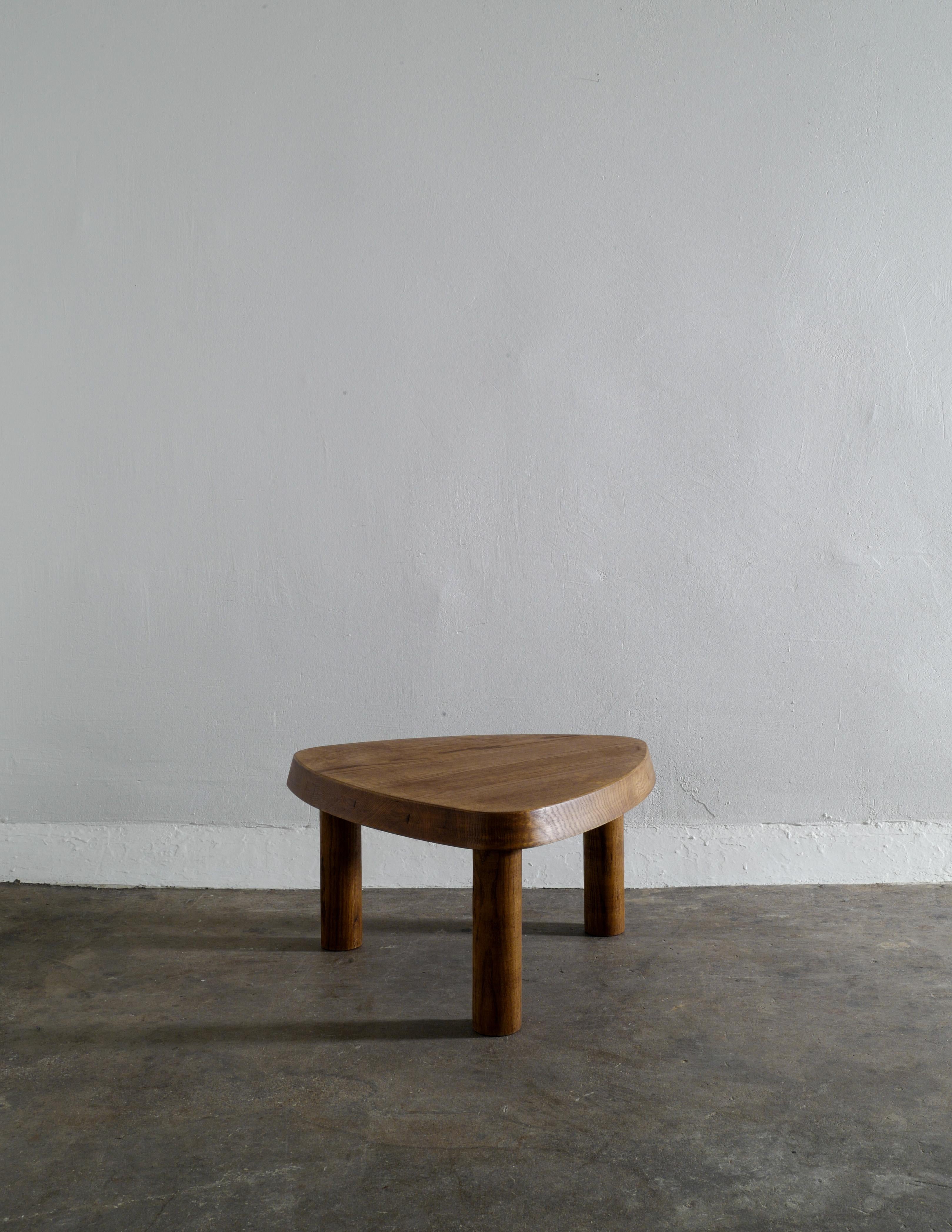 Rare side or coffee table in solid elm designed by Pierre Chapo from the 1970s. In good vintage and original condition with small signs from age and use.