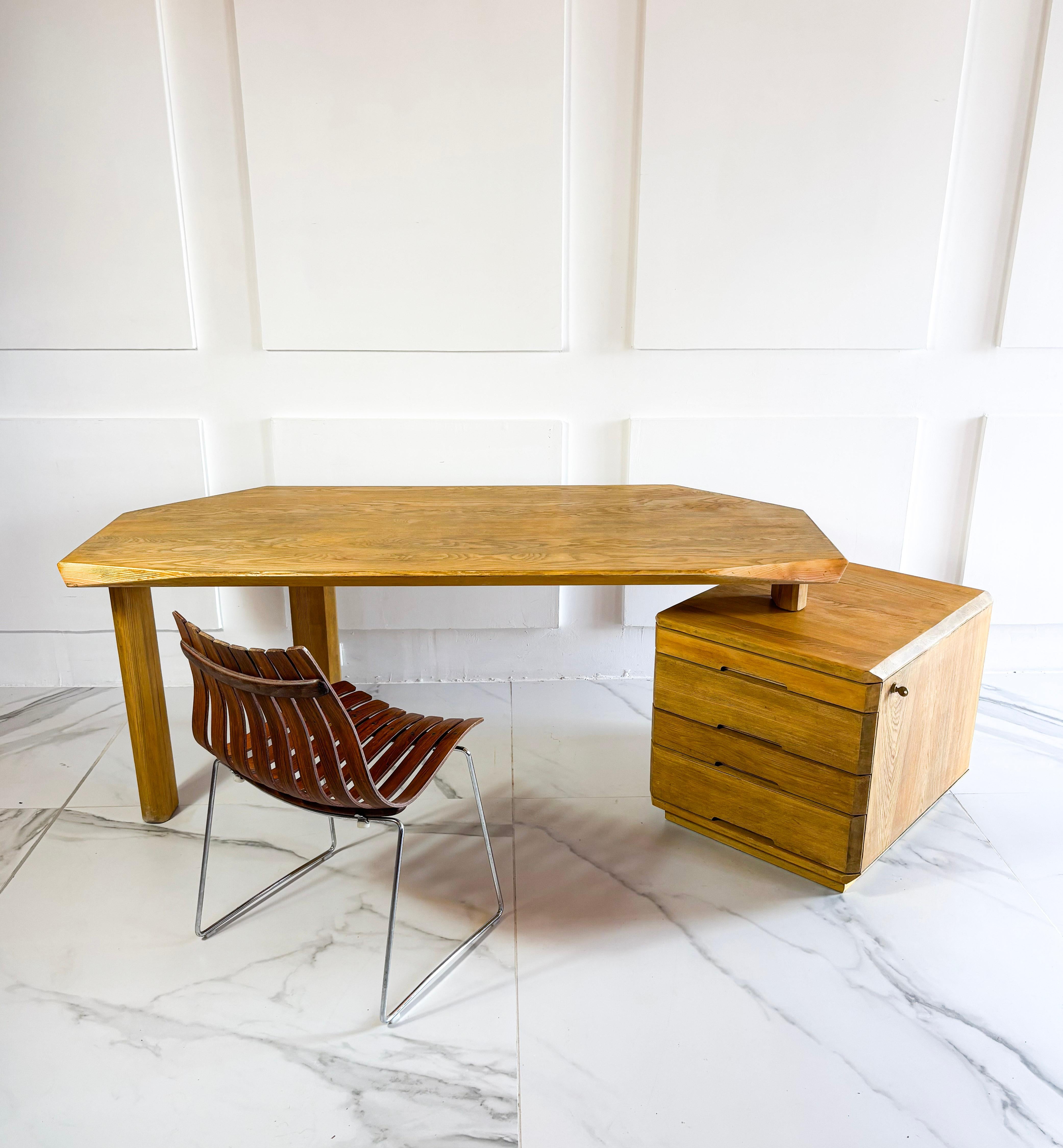 Large desk design by Pierre Chapo and produced in 1980. This desk B40 is made in solid Elml. The desk is in good vintage condition. The feet can be moved around to fit your space. The larger of the desk can also be adapted to some extended by moving