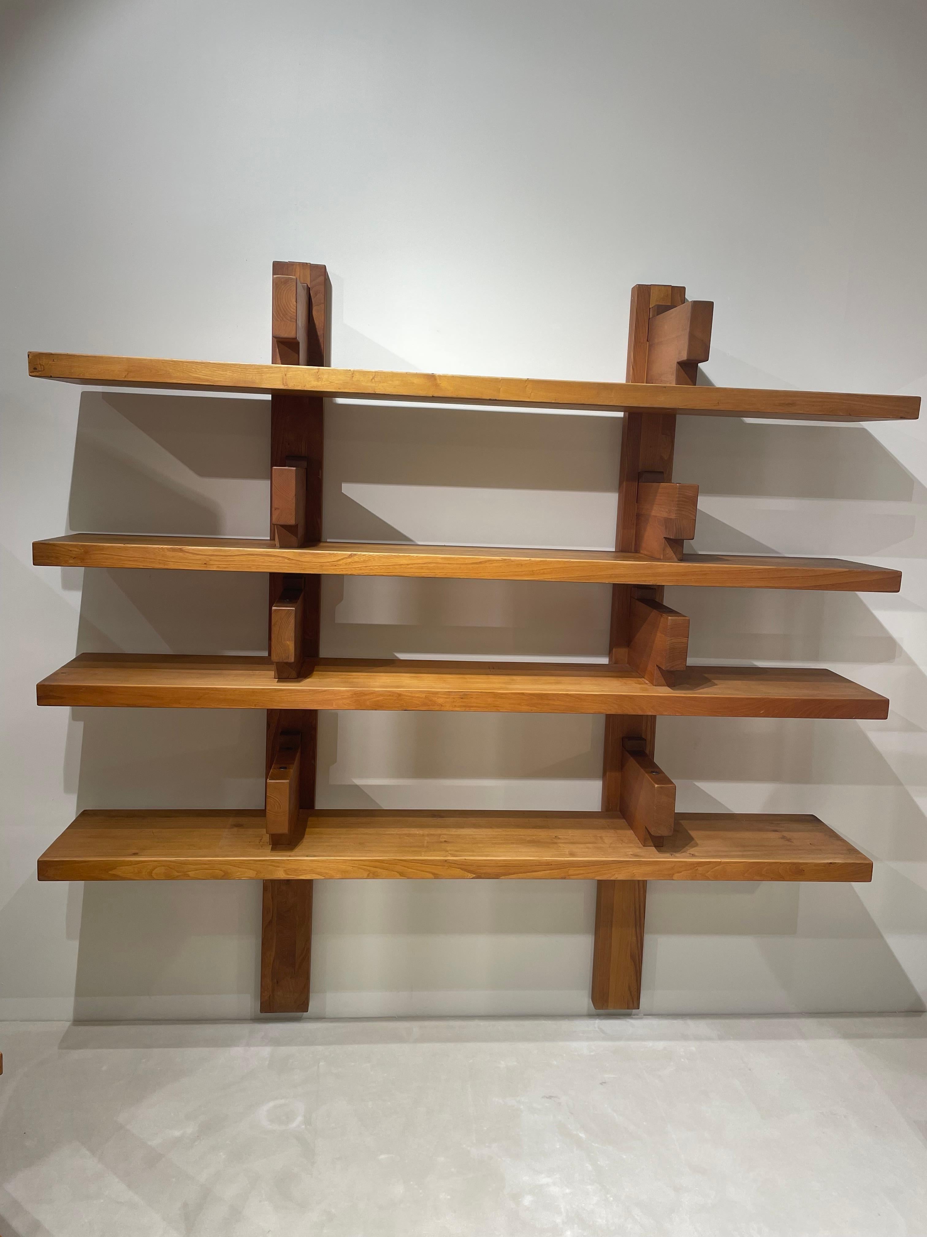 Pierre Chapo's iconic solid elm bookcase 1967

Pierre Chapo's bookcases are highly regarded on the art market for their purity of design and quality. Presented for the first time in 1967 at the Salon des Arts ménagers, the original design of this