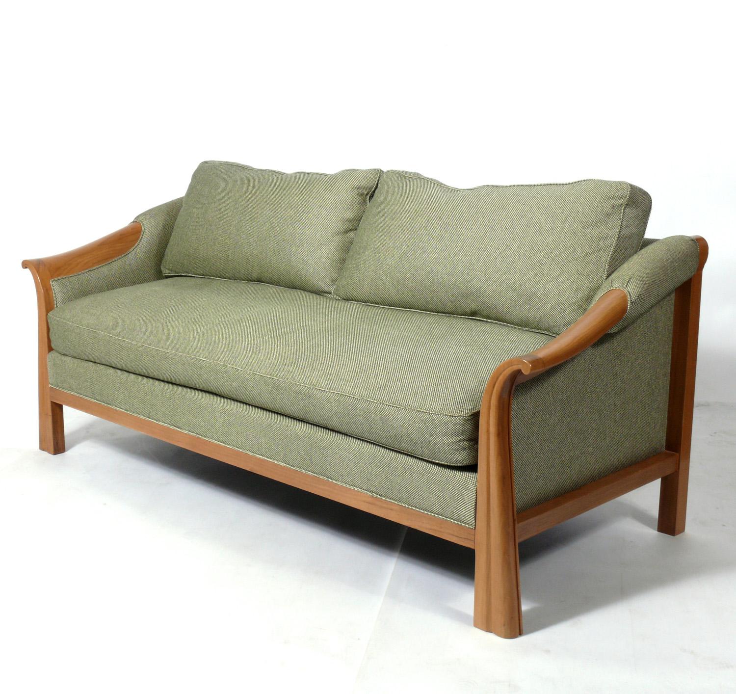 Pierre Chareau Art Deco style sofa, handmade by Nicholas Mongiardo, American, circa 1990s. Original sage green and ivory color fabric is in very good shape.