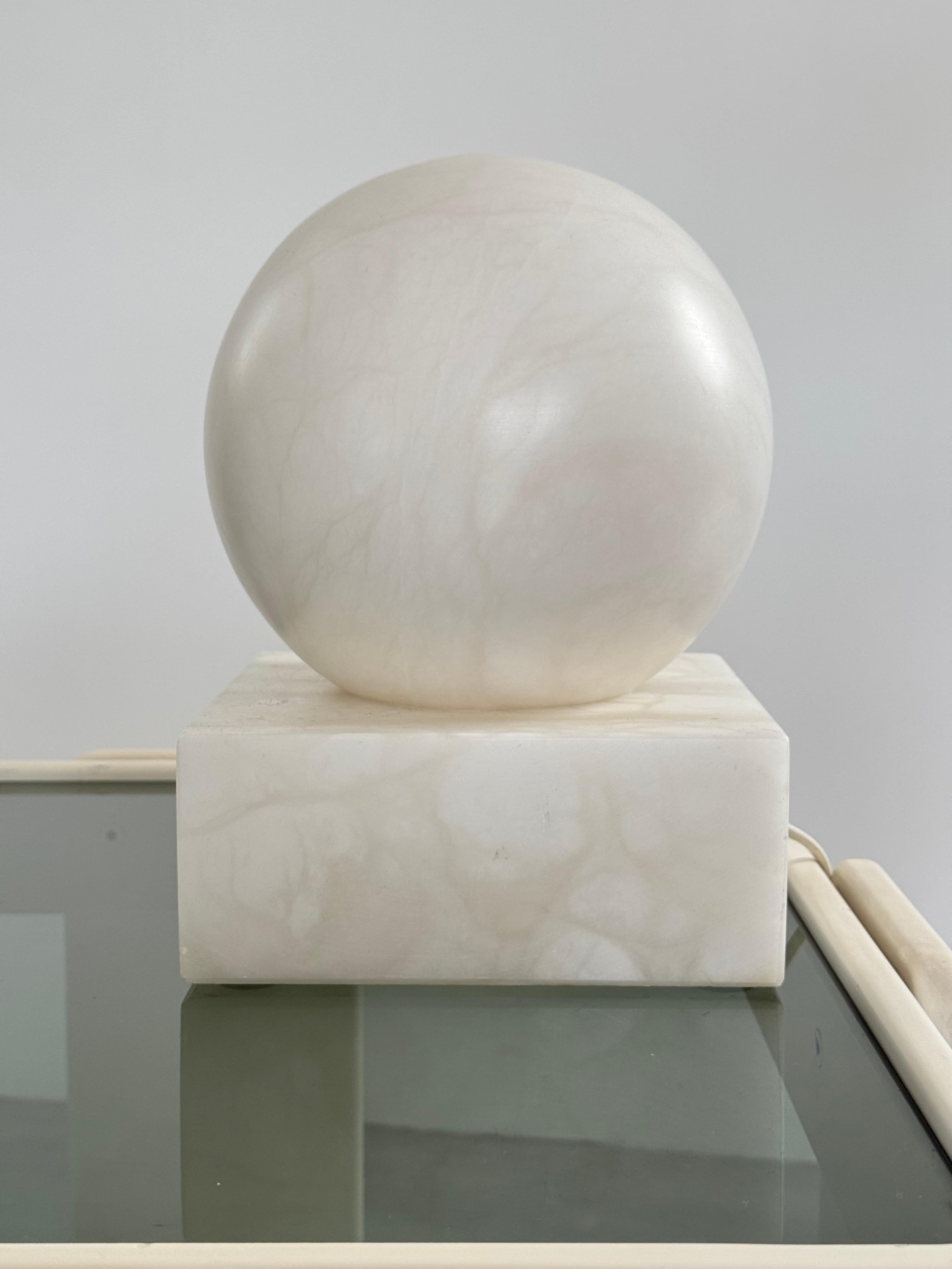 French Pierre Chareau style, White marble spherical table lamp, circa 1930s For Sale