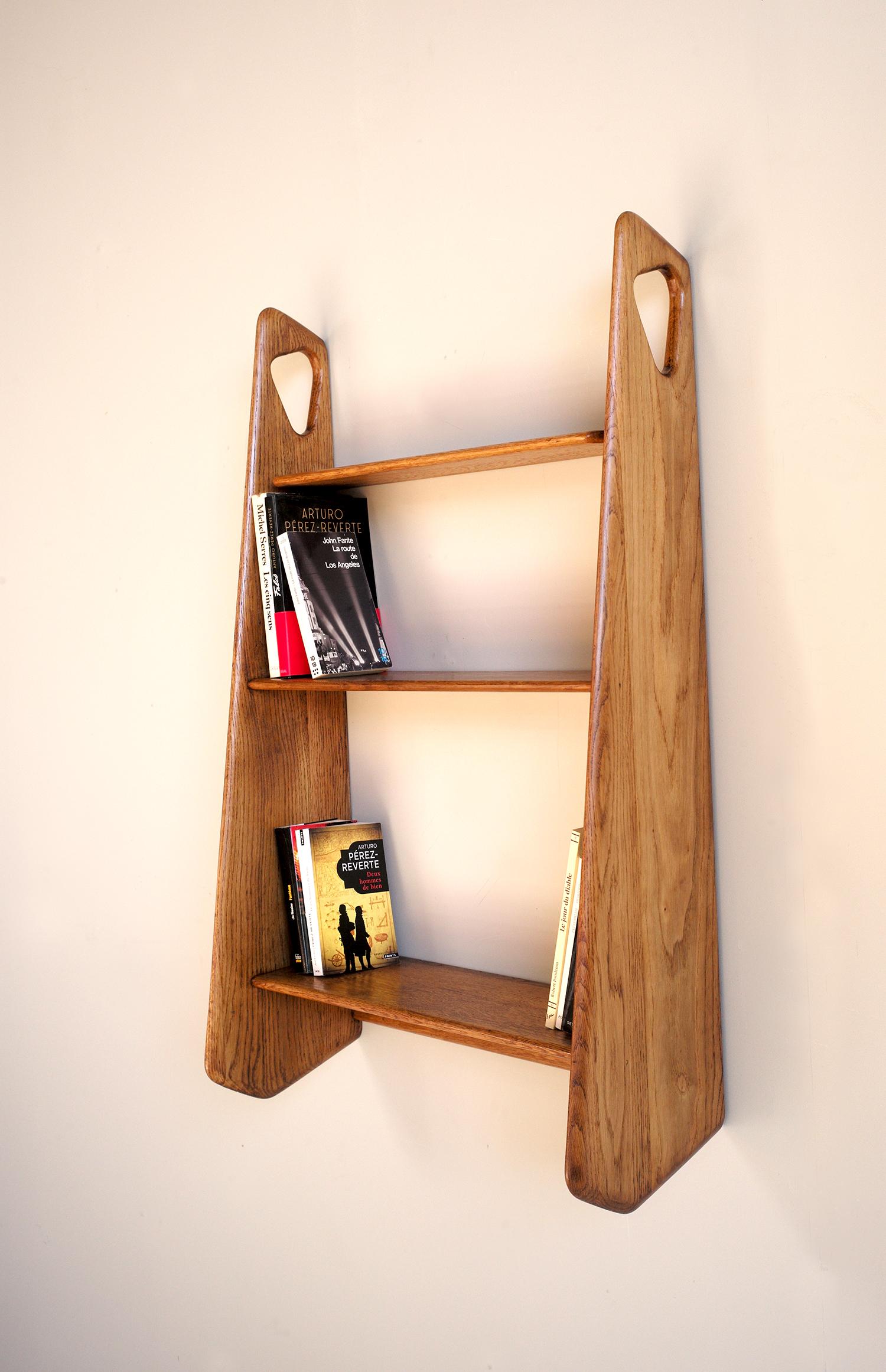 Pierre Cruège (1913-2003), wall bookcase in blond oak, Formes edition, France, 1950.
Very good condition.