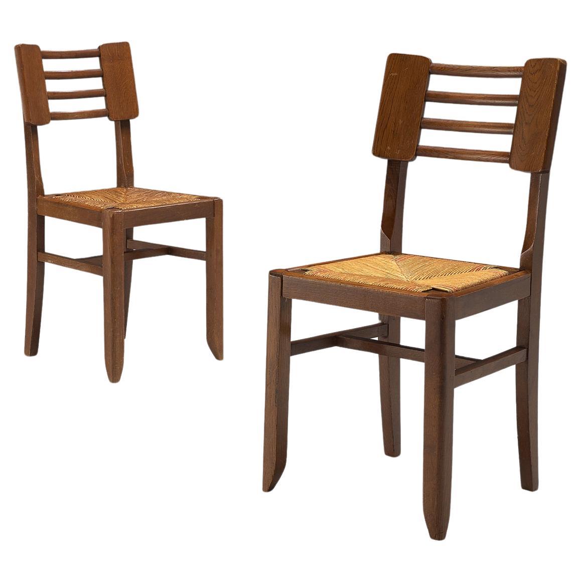 Pierre Cruège Pair of Dining Chairs in Oak and Straw 