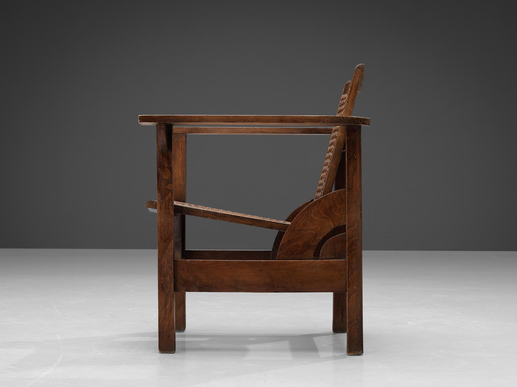 French Pierre Dariel 'Hendaye' Armchair in Dark Stained Wood and Cane