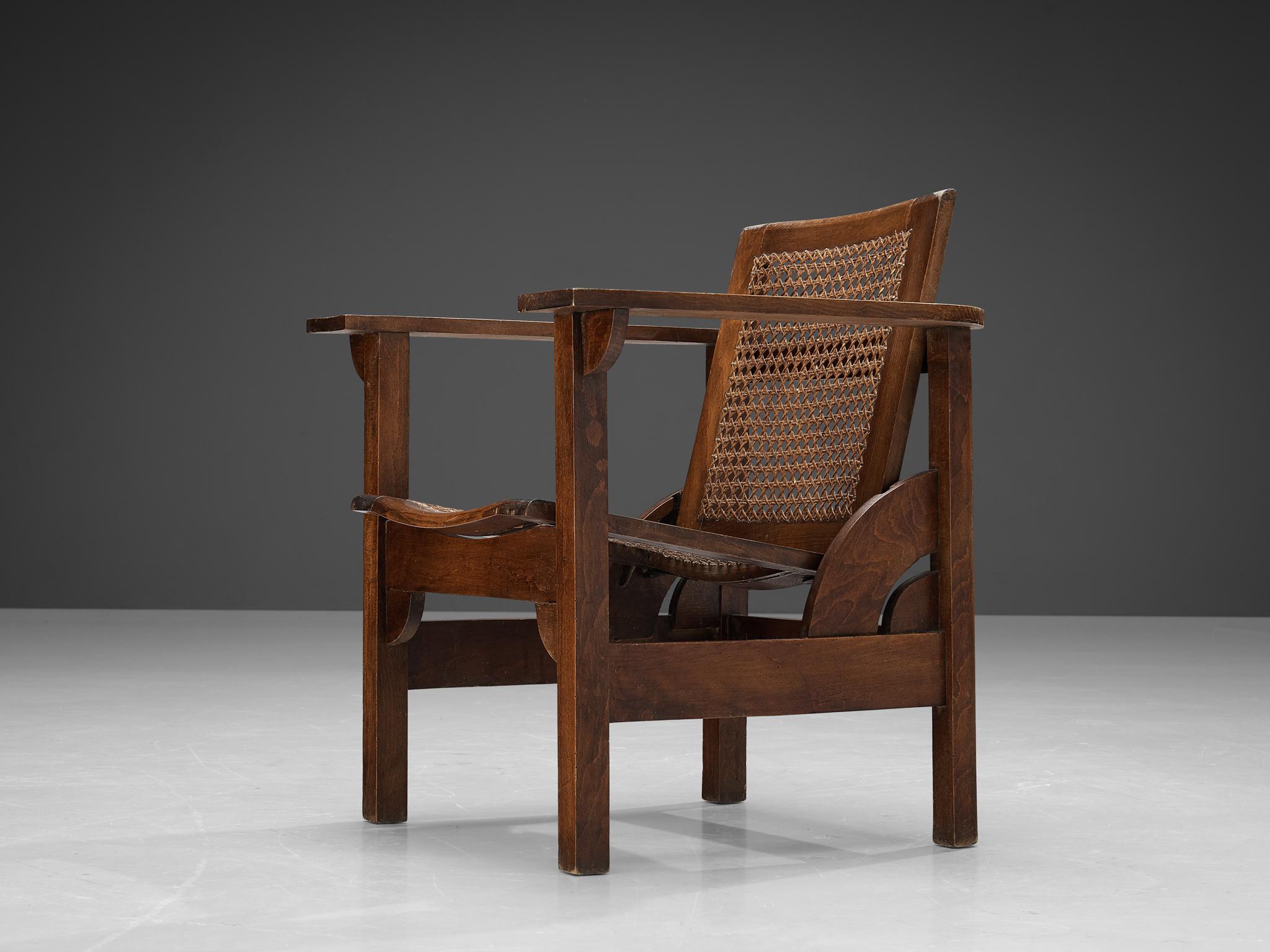 Pierre Dariel 'Hendaye' Armchair in Dark Stained Wood and Cane In Good Condition In Waalwijk, NL