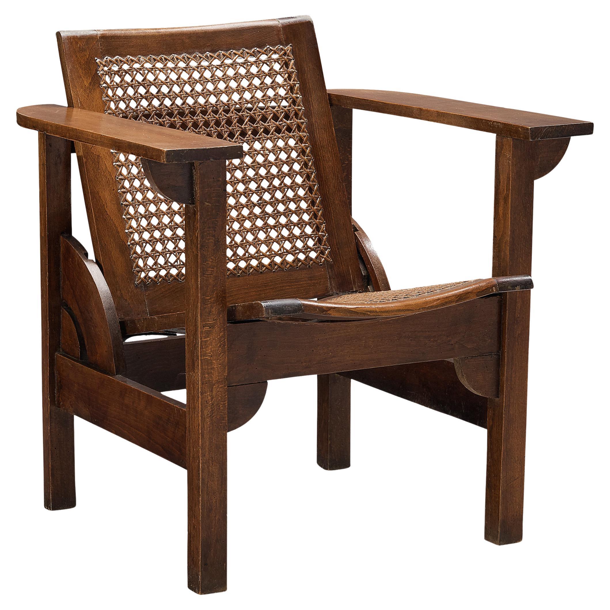 Pierre Dariel 'Hendaye' Armchair in Dark Stained Wood and Cane