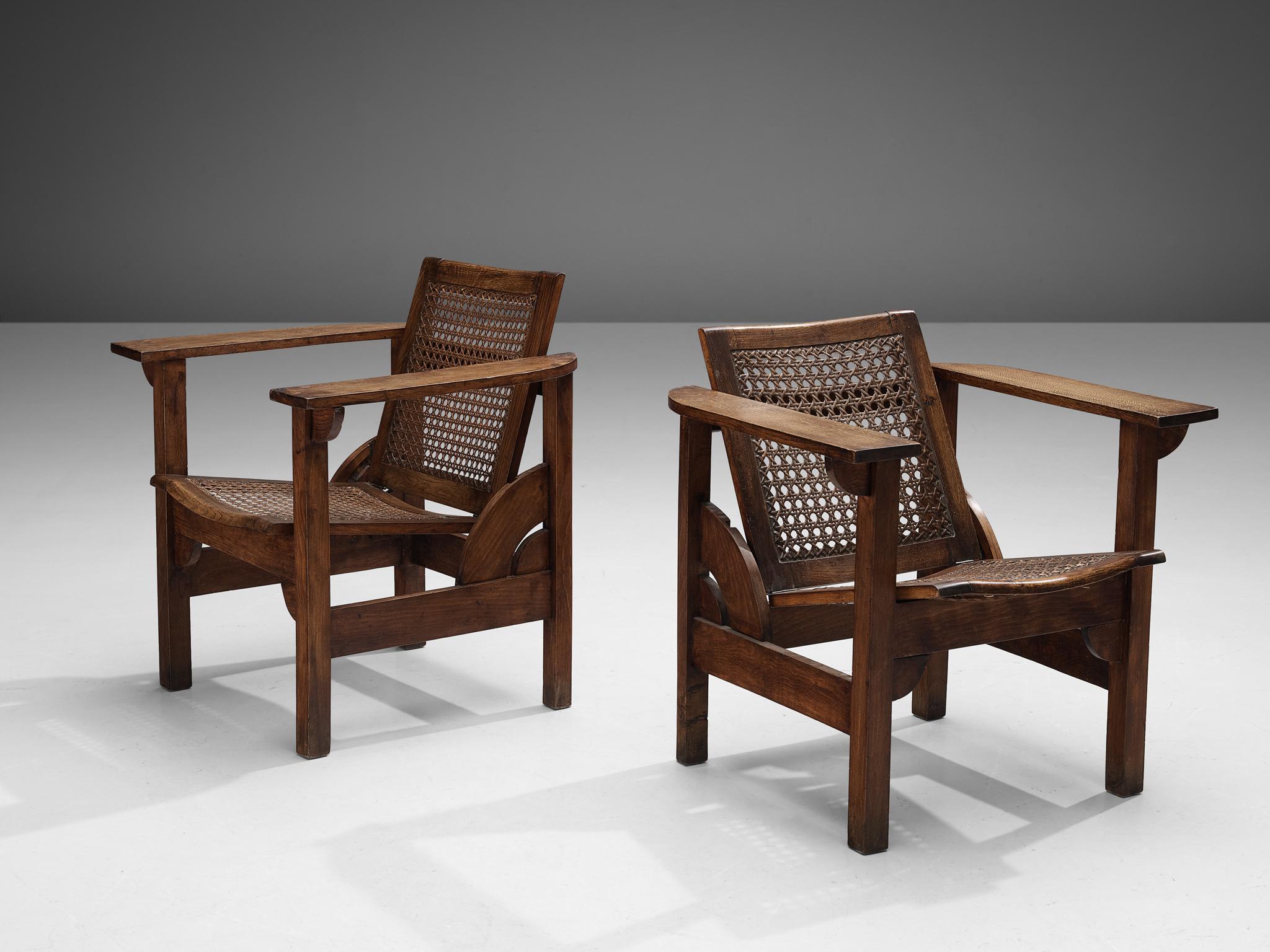 Pierre Dariel, pair of Hendaye armchairs, oak, beech, cane, France, 1930s.

Pair of Hendaye model armchairs designed by Pierre Dariel in the 1930s. The structure is composed entirely out of oak and beech, while the seat and backrest are made of
