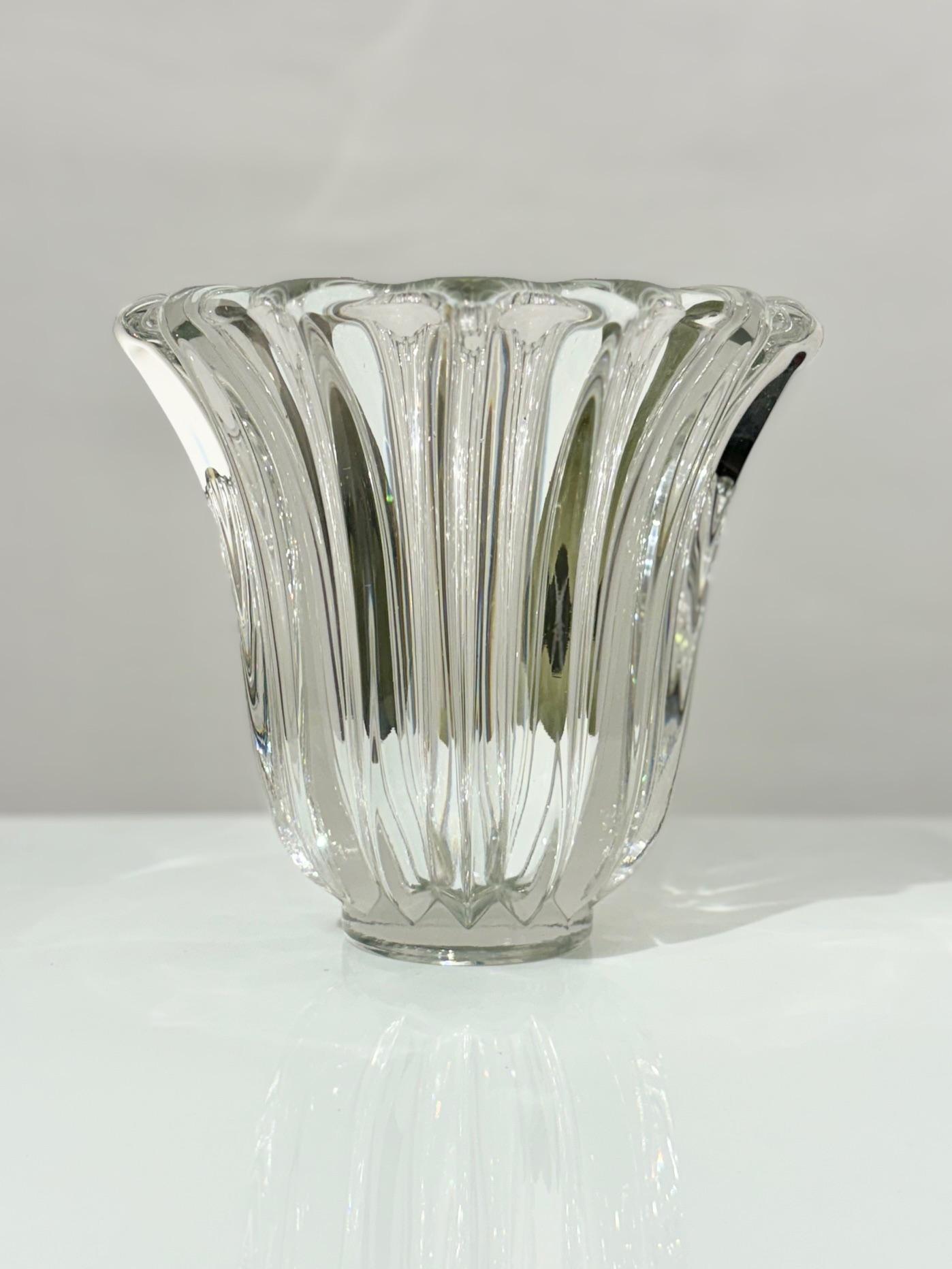 Thick molded glass vase by Pierre d'Avesn. Excellent vintage condition, all edges are perfect. The vase is signed at its base. Dim: height 27 cm (10,6 in.) diameter 22 cm (9,7 in.)
Pierre D'Avesn (1901-1990) was an artist who produced industrial Art