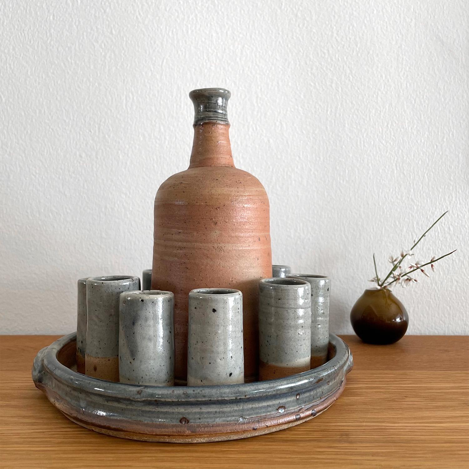 Pierre Digan stoneware service set
France, circa 1970’s
This handmade set has a wonderful organic composition and feel
Two toned french blue glazed ceramic perfectly accents the rich brown stoneware
Patina from age and use
Twelve piece service set