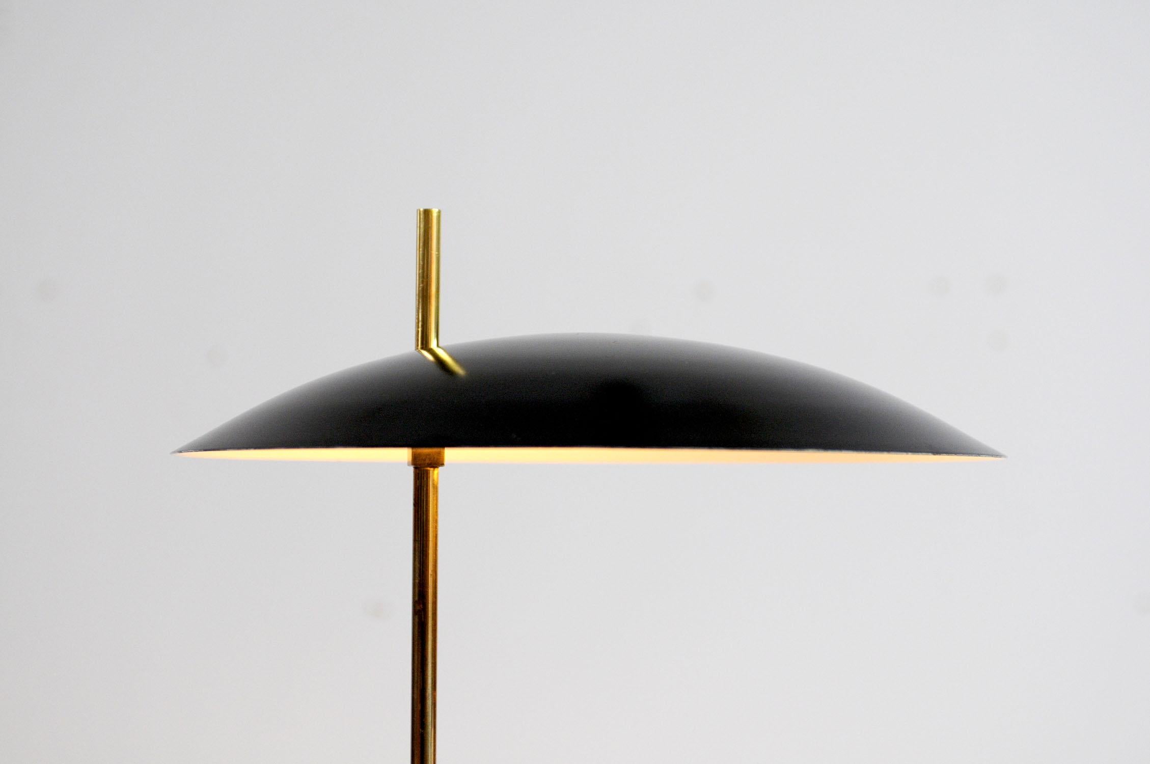 Pierre Disderot, rare table lamp model 1013, original edition from the fifties, France, 1955. Black lacquered metal, golden brass, switch under the reflector.
Very good original condition.