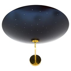 Pierre Disderot Model #2059 Large Perforated Wall Lamp in Black and Brass