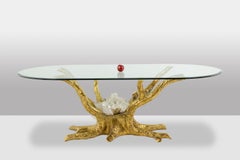 Pierre Duval Brasseur. Mesa de comedor de latón dorado. Alrededor de 1970.