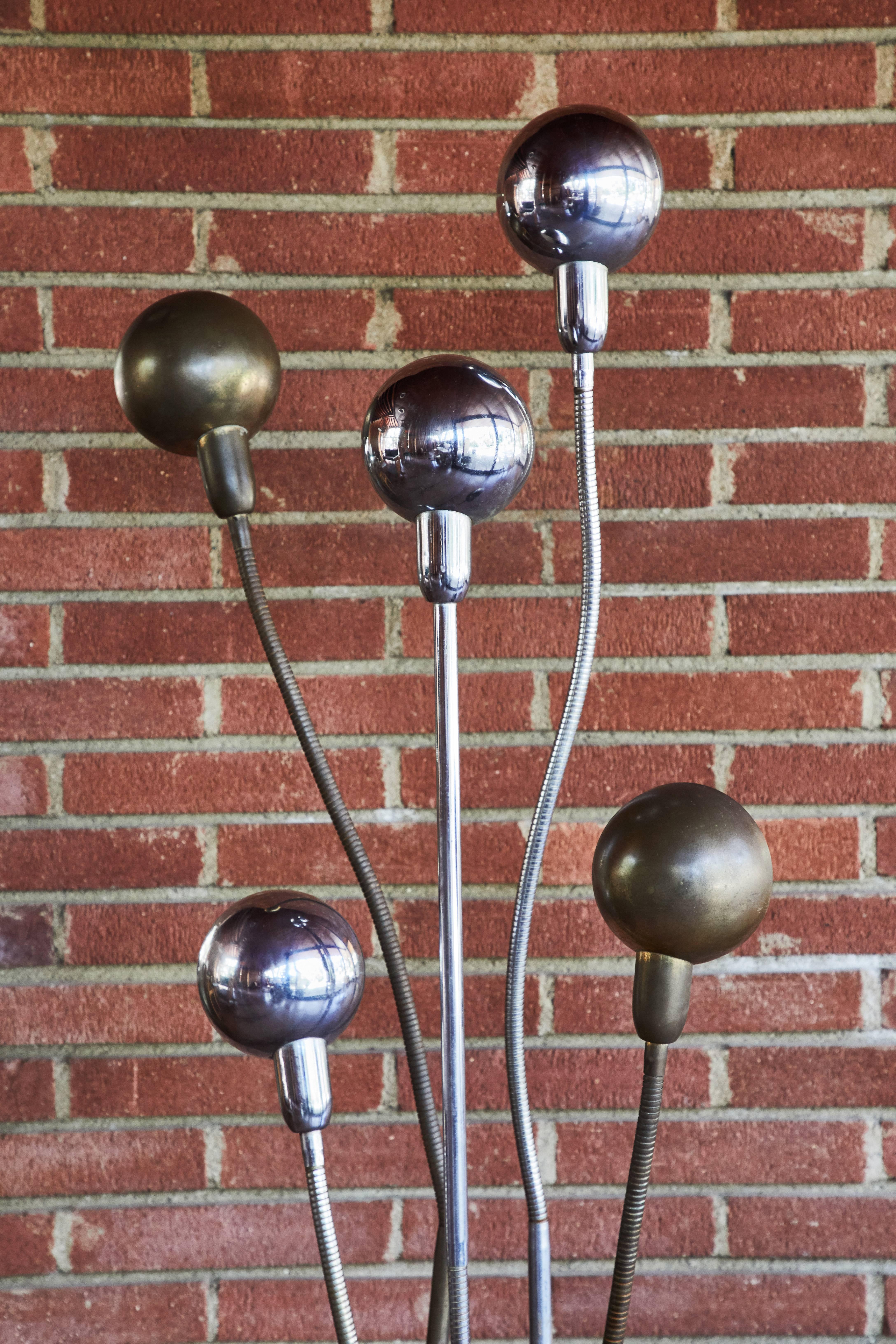 Pierre Folie 'Hydra' floor lamp for Jacques Charpentier. Designed in 1960, this is a rare Charpentier produced example executed in both chrome and brass. This sculptural lamp can be adjusted to an infinite variety of expressive positions and unique