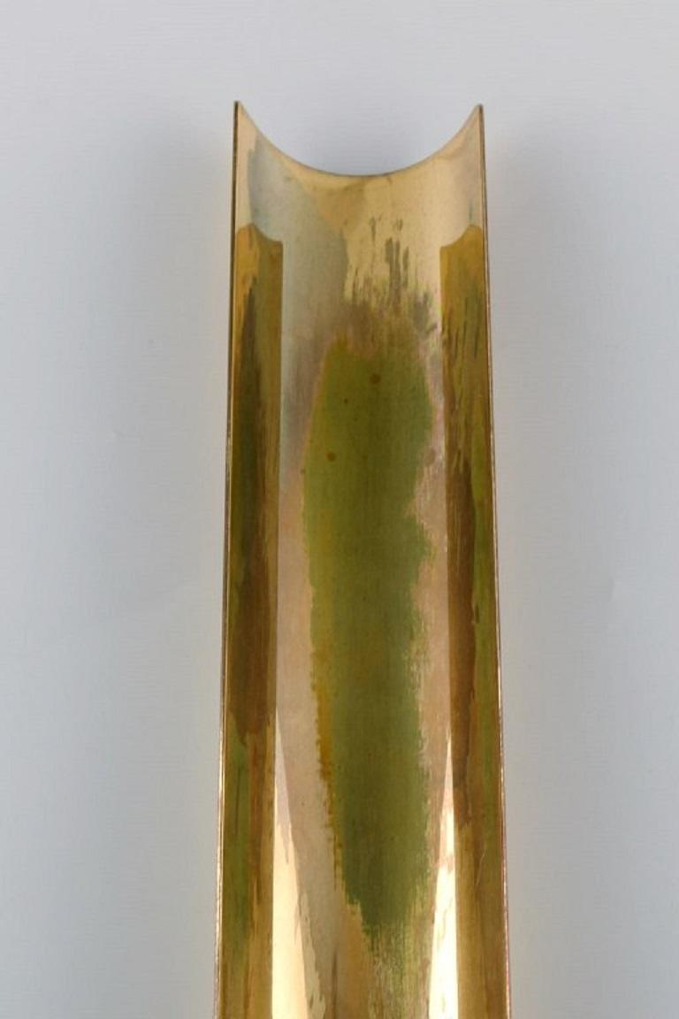 Pierre forsell for Skultuna. Reflex wall candlestick in brass. 
Swedish design, 1960s.
Measures: 38 x 6.5 cm.
In excellent condition with patina.
Can be polished so it appears new.
Stamped.