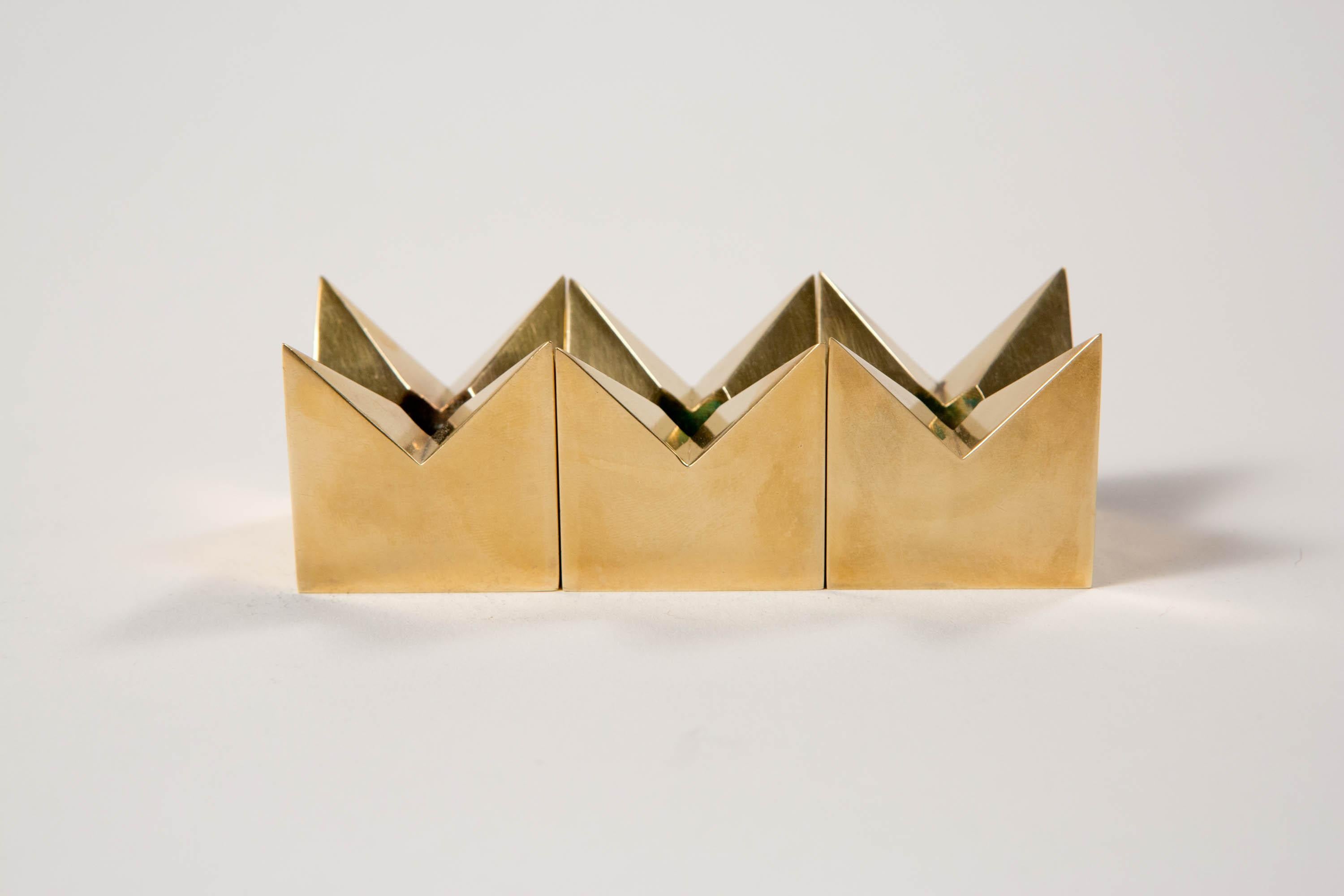 Pierre Forssell - 3 Brass Star Candleholders for Skultuna, Sweden, 1960s

Maker's mark and signature on bottom.

Pierre Forsell (1925 - 2004) grew up in central Stockholm. He was trained as a silversmith and got his journeyman's certificate in