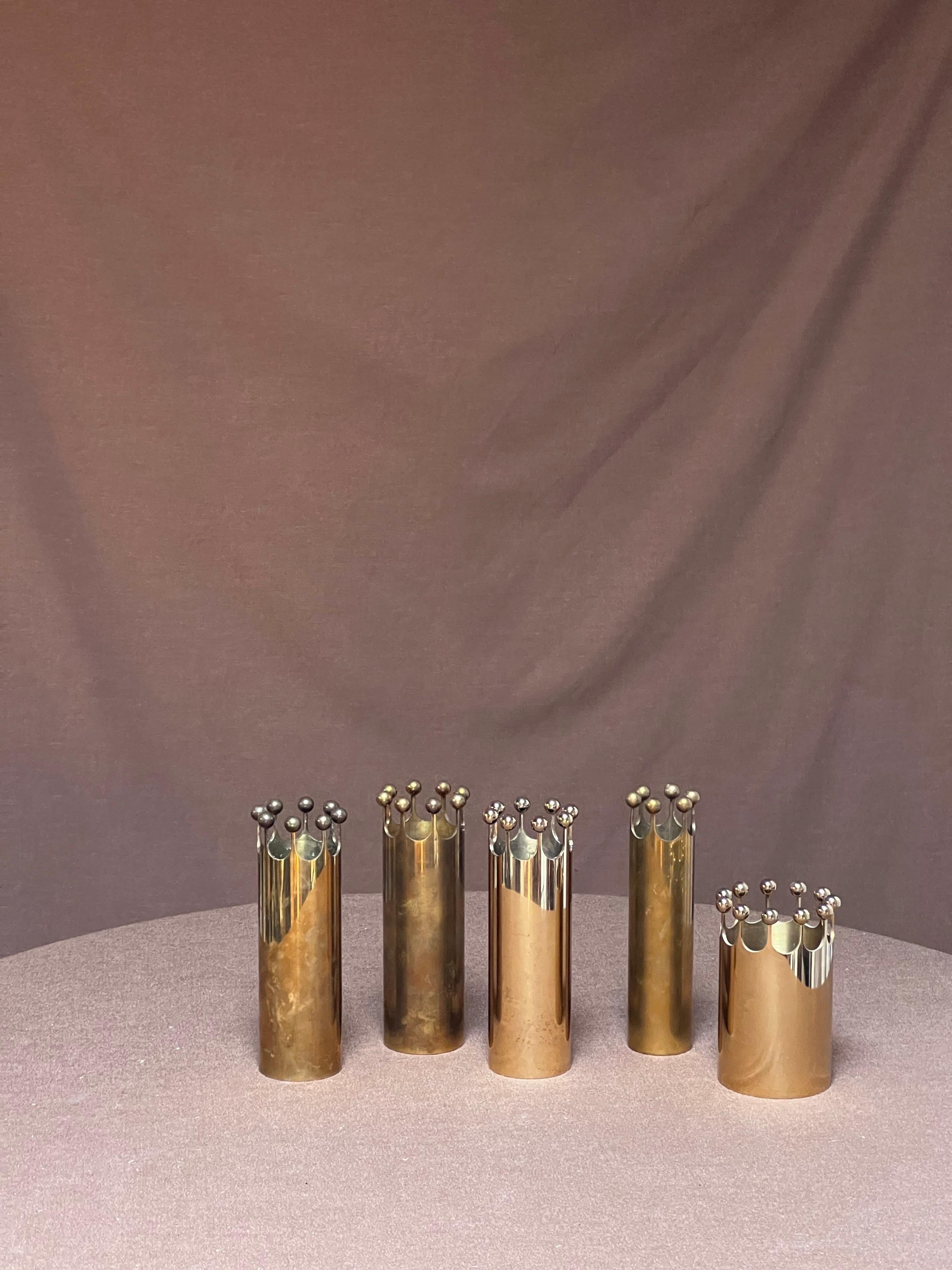 This series of Vases was hand crafted in the 1970's and 1980's at the Skultuna studio were Pierre Forssell was working with his assistant. The vases is made of brass. Simple, minimal and elegant at the same time. The small balls provides a warm and